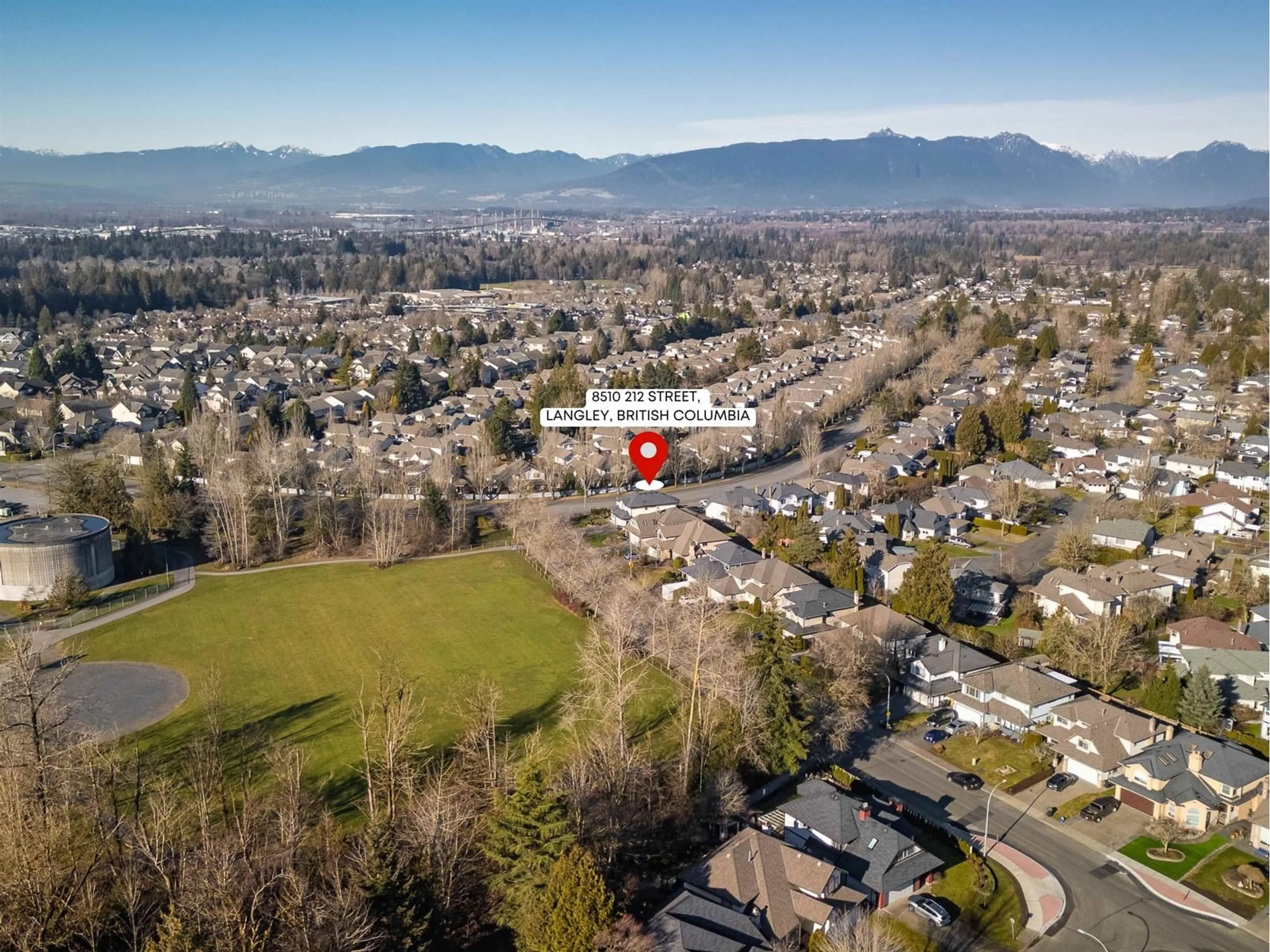 A pic from outside/outdoor area/front of a property/back of a property/a pic from drone, mountain view for 8510 212 STREET, Langley British Columbia V1M2E7