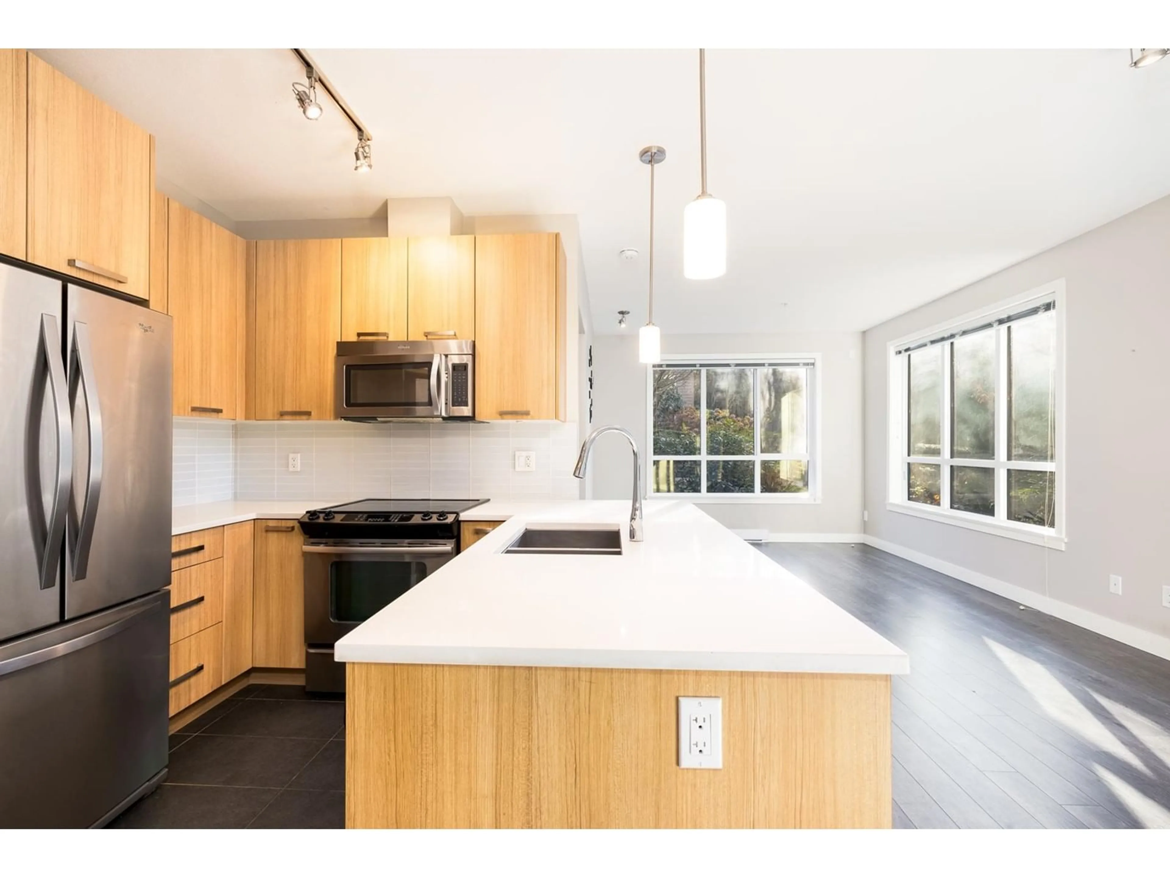 Open concept kitchen, unknown for 210 15388 105 AVENUE, Surrey British Columbia V3R0C4