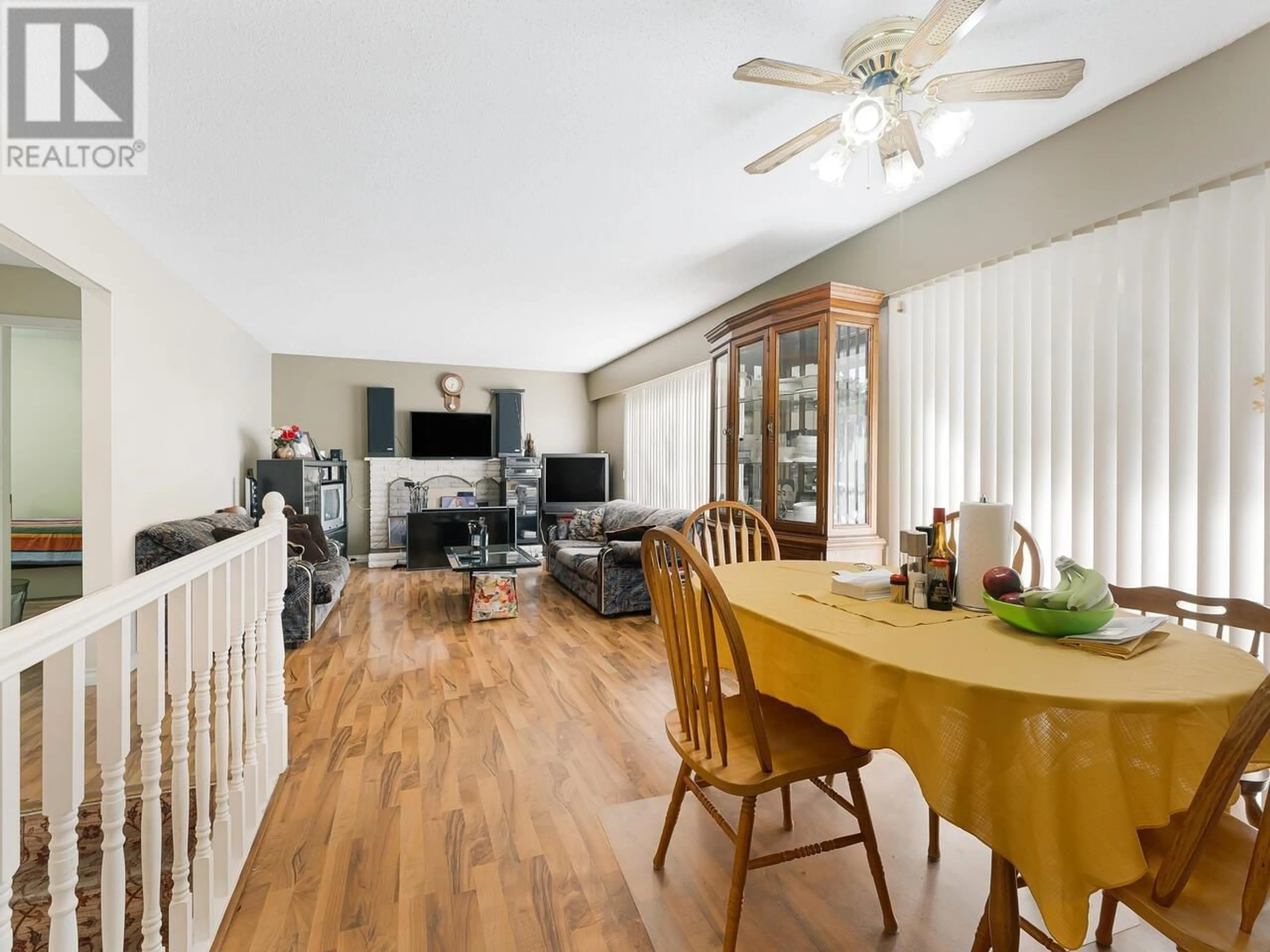 Living room with furniture, wood/laminate floor for 2119 SALISBURY AVENUE, Port Coquitlam British Columbia V3B5L5