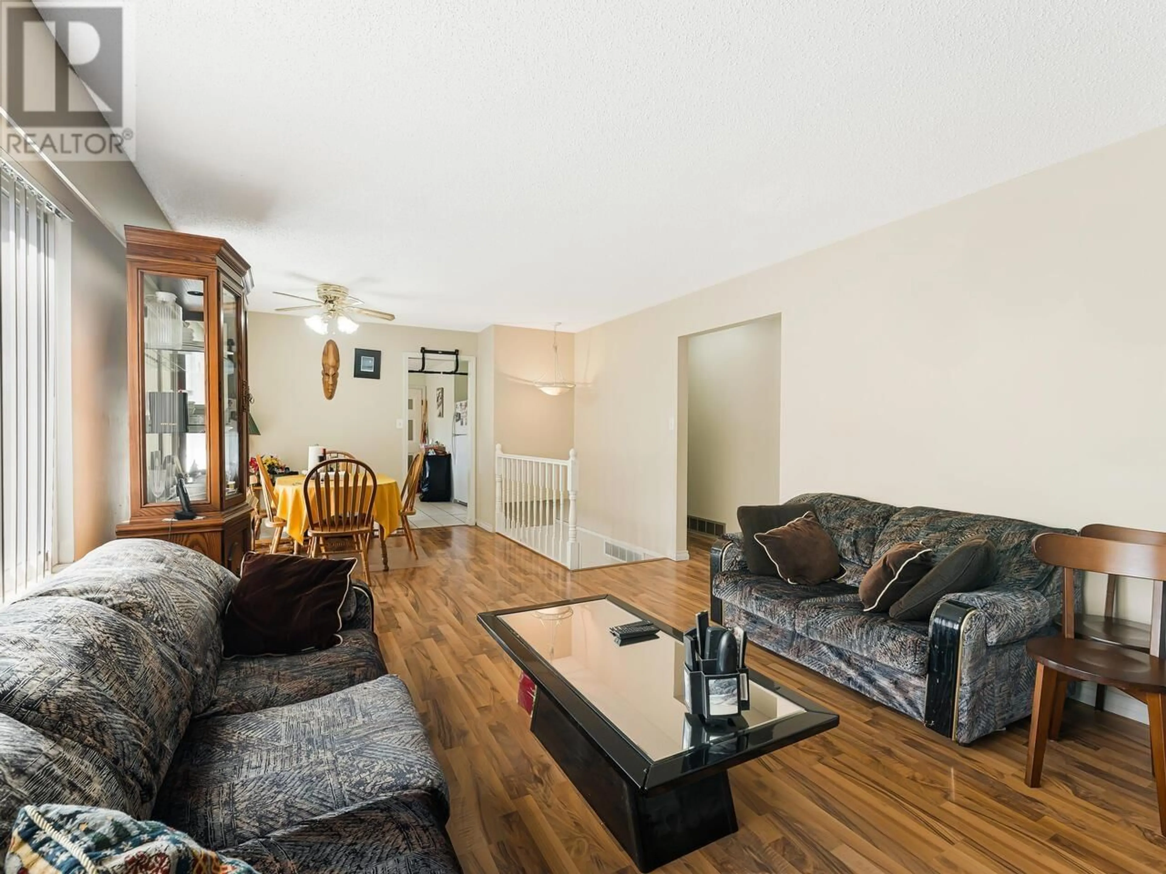 Living room with furniture, wood/laminate floor for 2119 SALISBURY AVENUE, Port Coquitlam British Columbia V3B5L5