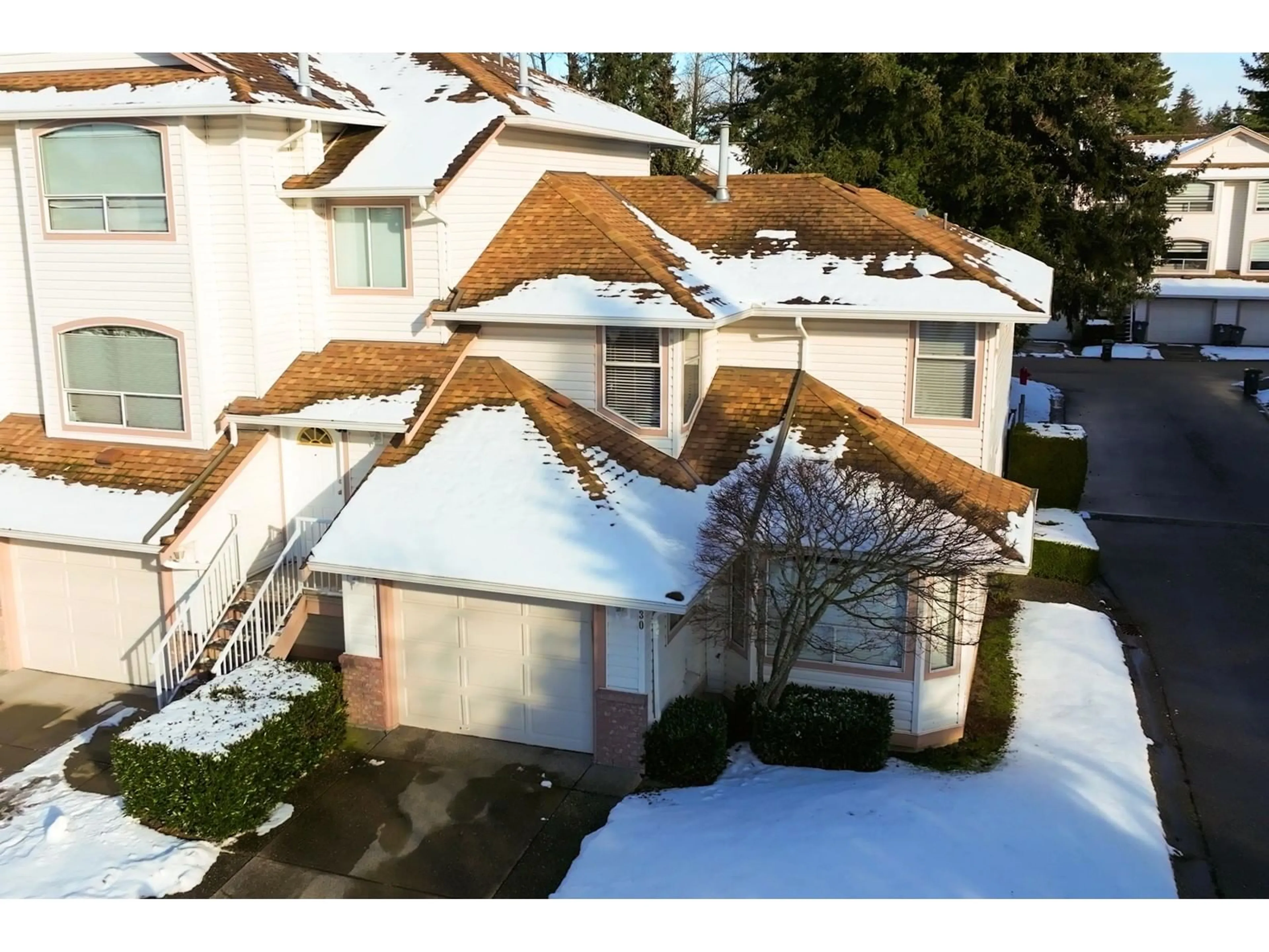 A pic from outside/outdoor area/front of a property/back of a property/a pic from drone, street for 30 - 7140 132, Surrey British Columbia V3W1J5