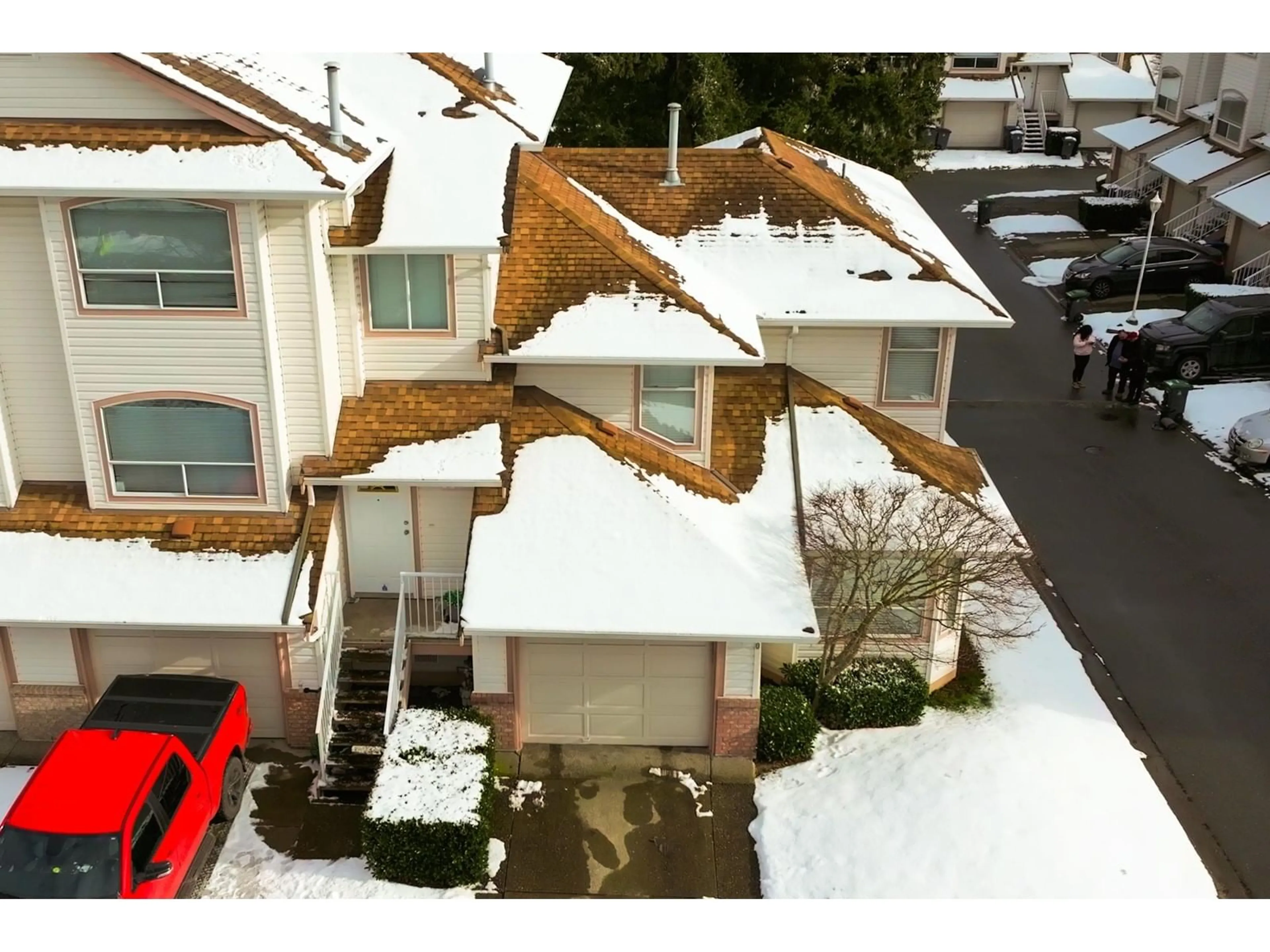 A pic from outside/outdoor area/front of a property/back of a property/a pic from drone, street for 30 - 7140 132, Surrey British Columbia V3W1J5