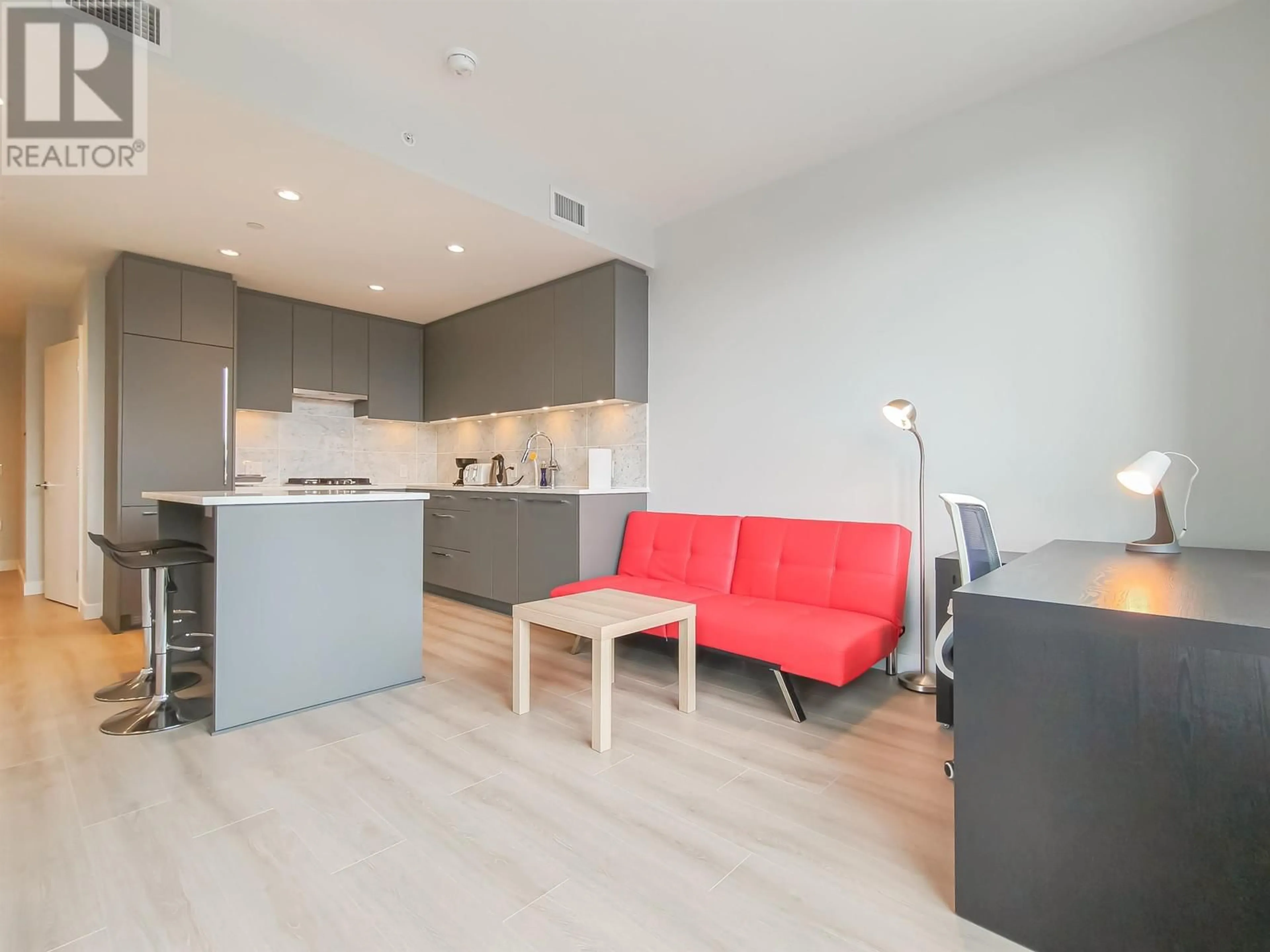 Open concept kitchen, wood/laminate floor for 509 - 5380 CROOKED BRANCH ROAD, Vancouver British Columbia V6T0E5