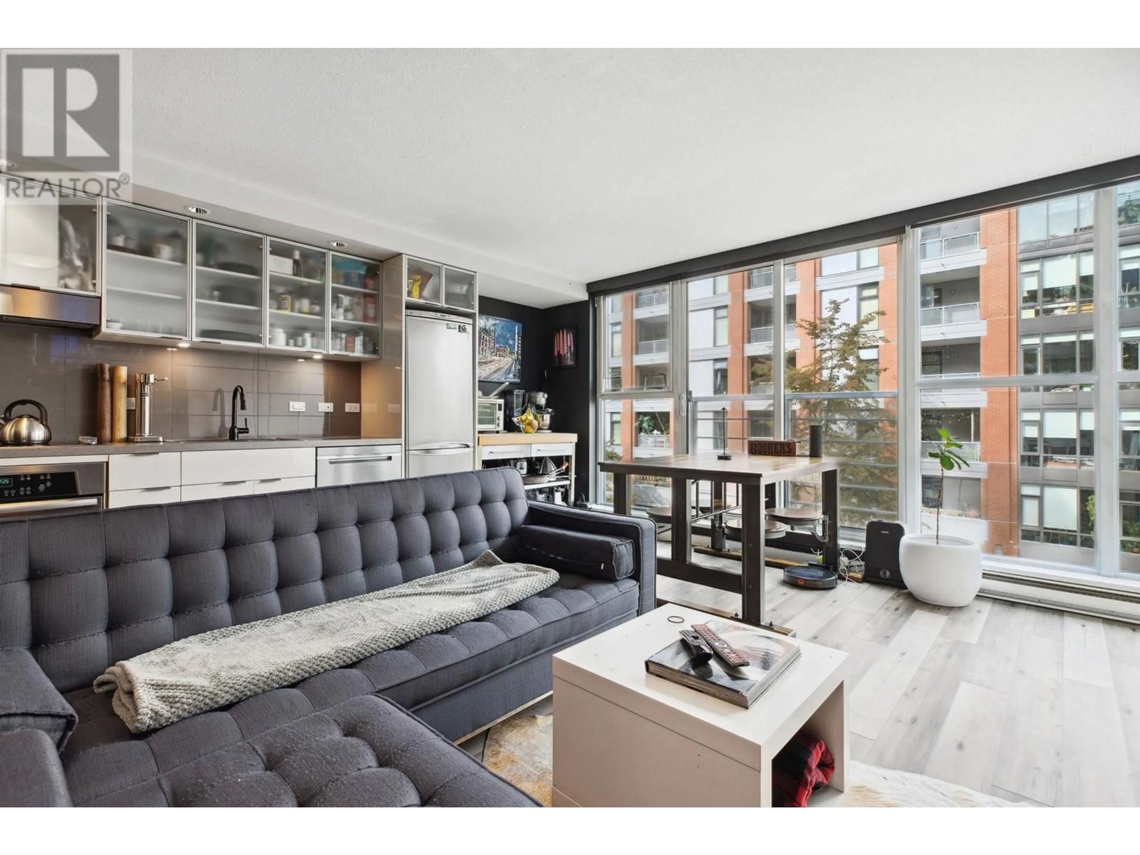 Living room with furniture, wood/laminate floor for 509 168 POWELL STREET, Vancouver British Columbia V6A0B2