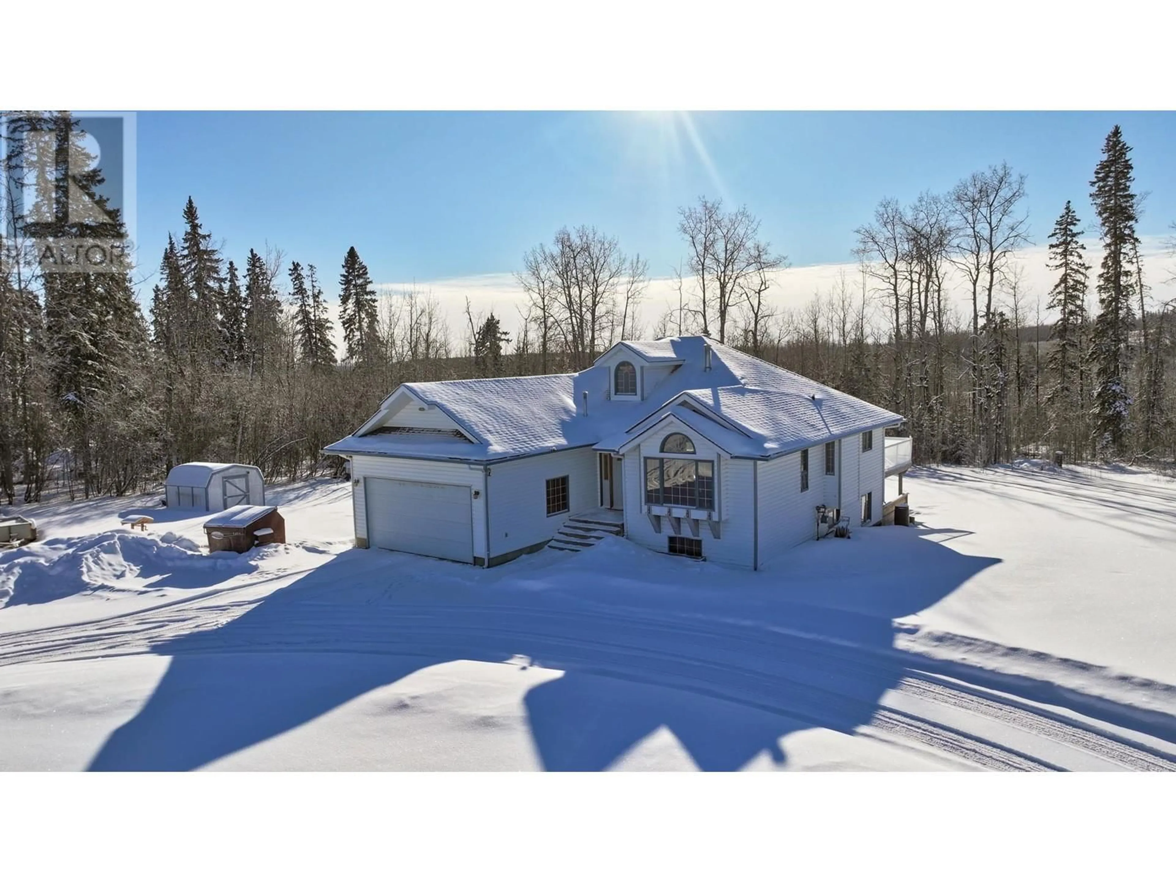 A pic from outside/outdoor area/front of a property/back of a property/a pic from drone, building for 14259 EVERGREEN ROAD, Fort St. John British Columbia V0C1H0