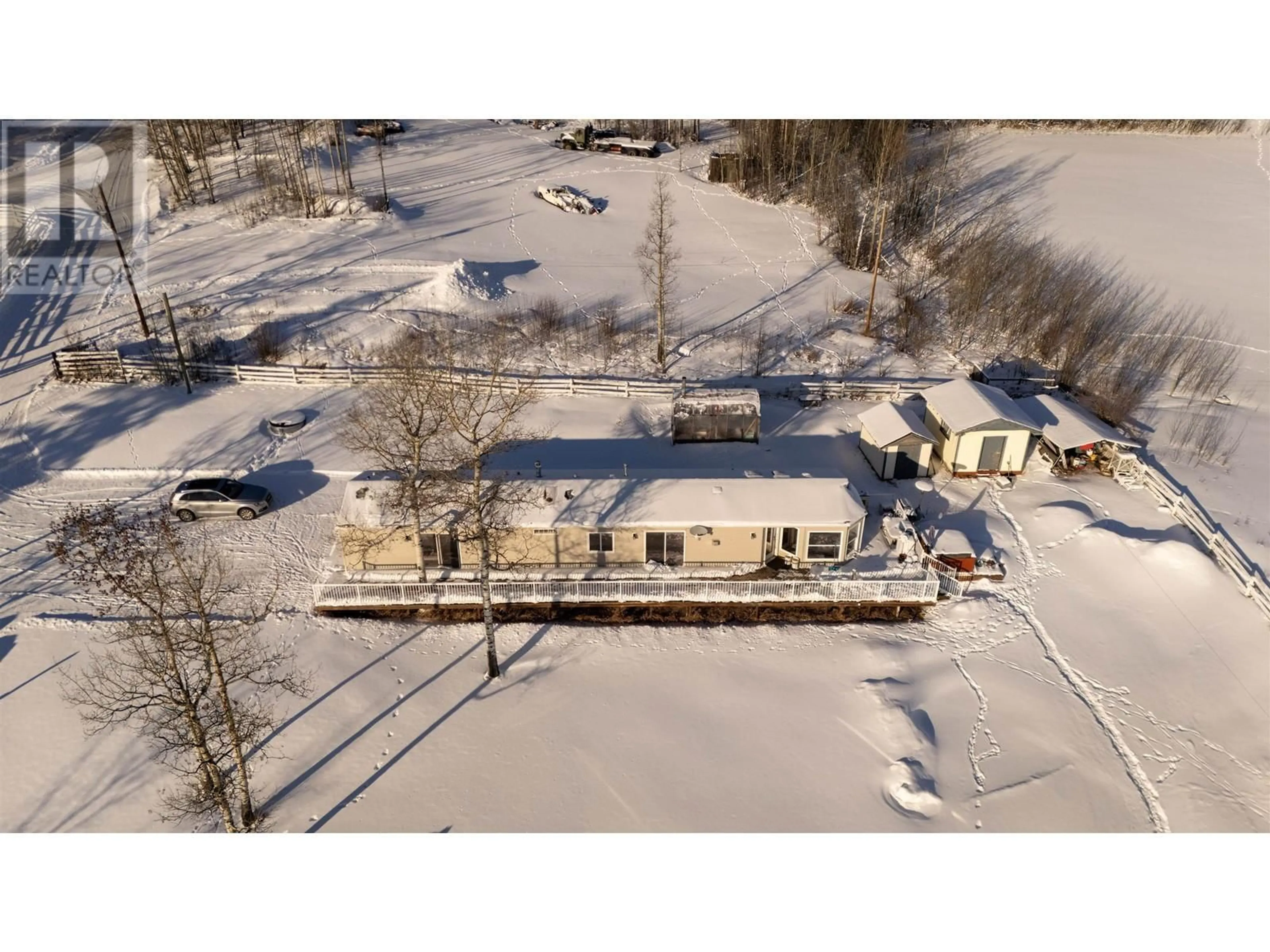 A pic from outside/outdoor area/front of a property/back of a property/a pic from drone, unknown for 12674 RIMROCK DRIVE, Charlie Lake British Columbia V0C1H0