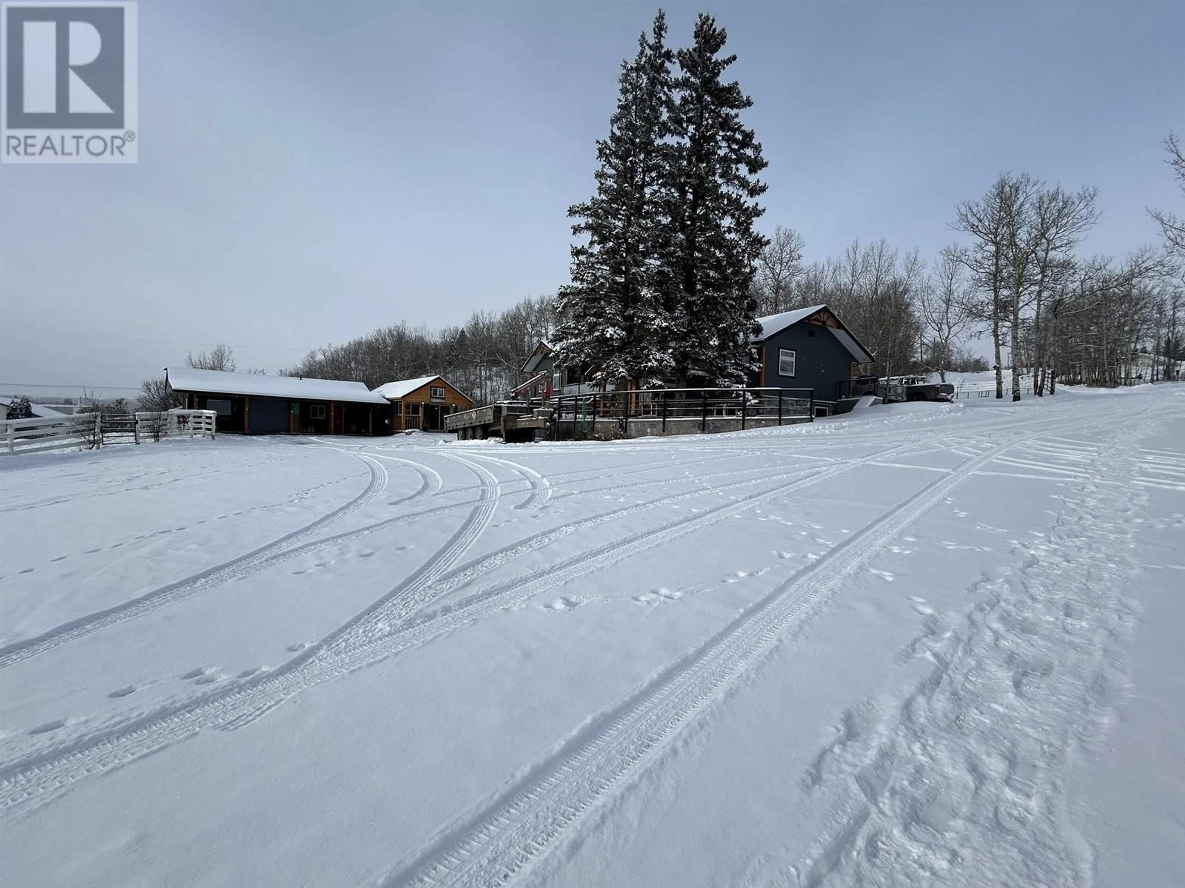 A pic from outside/outdoor area/front of a property/back of a property/a pic from drone, unknown for 12698 RIMROCK DRIVE, Charlie Lake British Columbia V0C1H0
