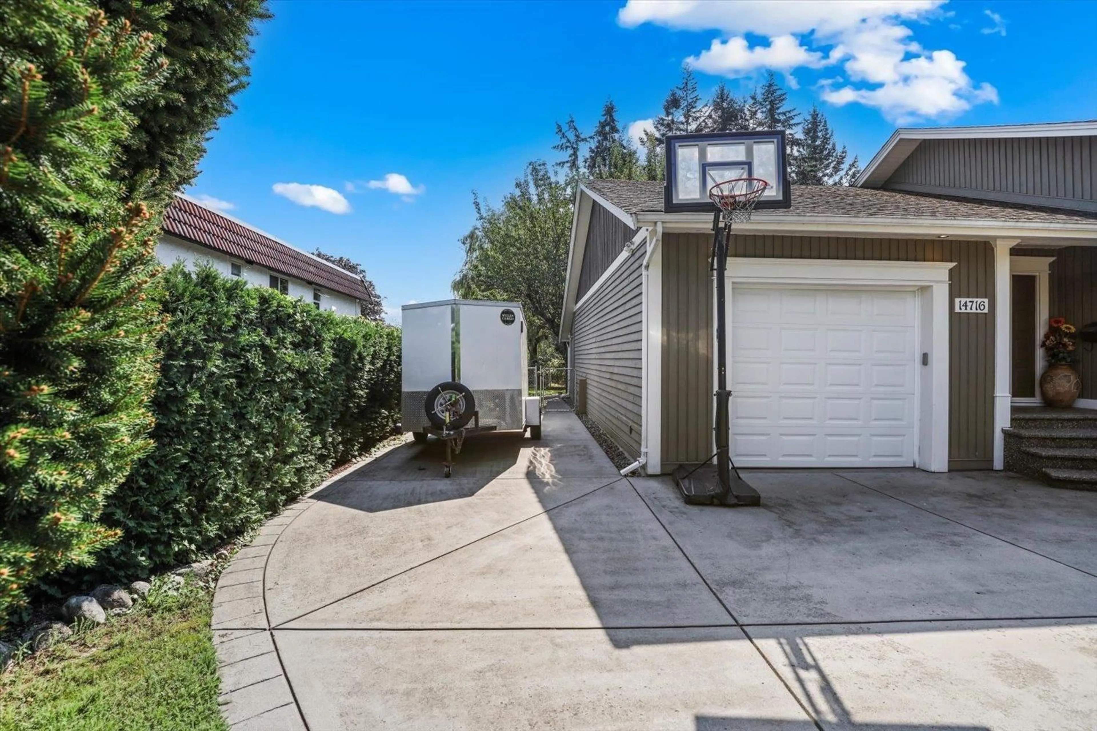 A pic from outside/outdoor area/front of a property/back of a property/a pic from drone, street for 14716 55A, Surrey British Columbia V3S1B2