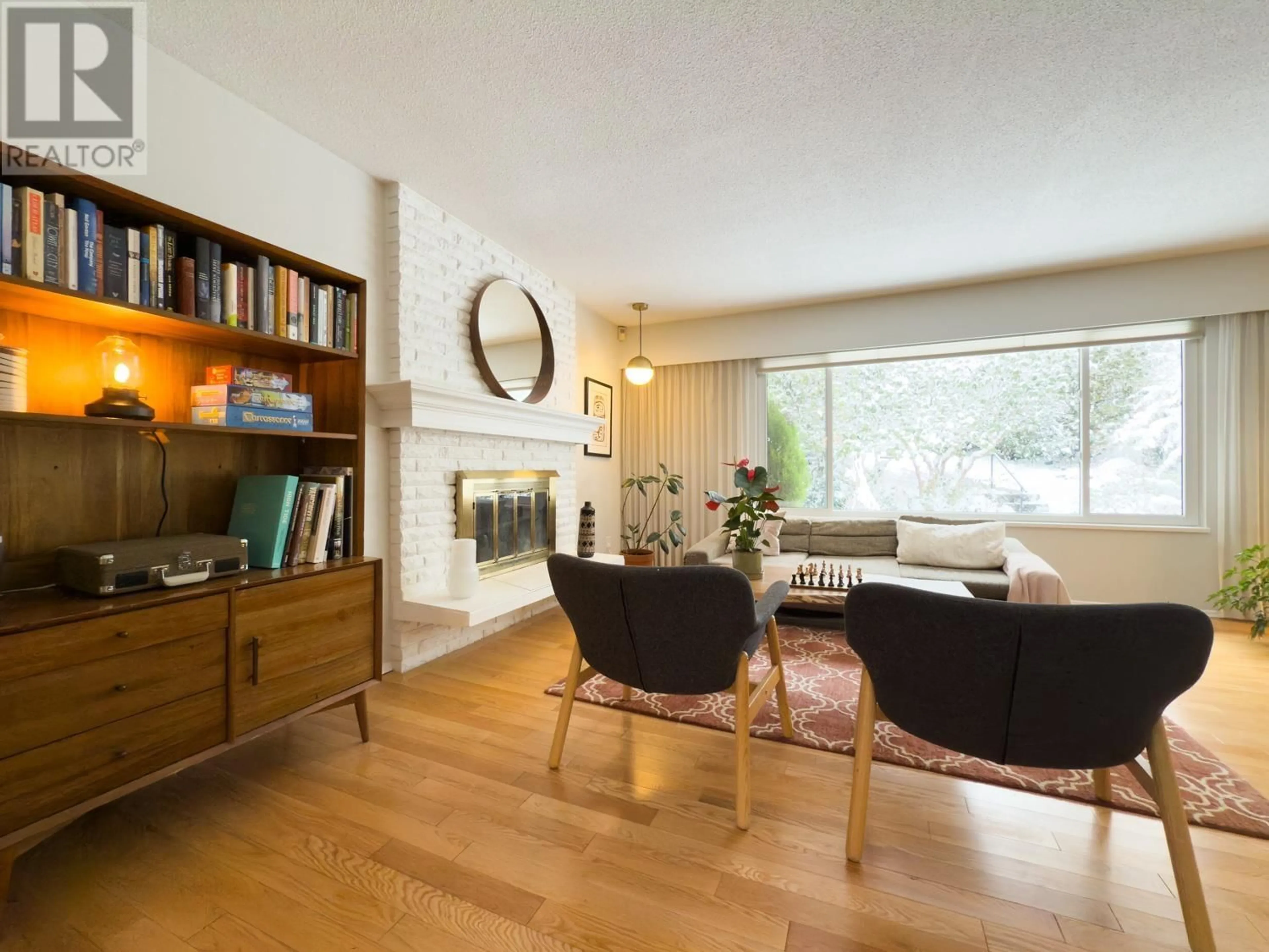 Living room with furniture, wood/laminate floor for 5405 RANGER AVENUE, North Vancouver British Columbia V7R3M7