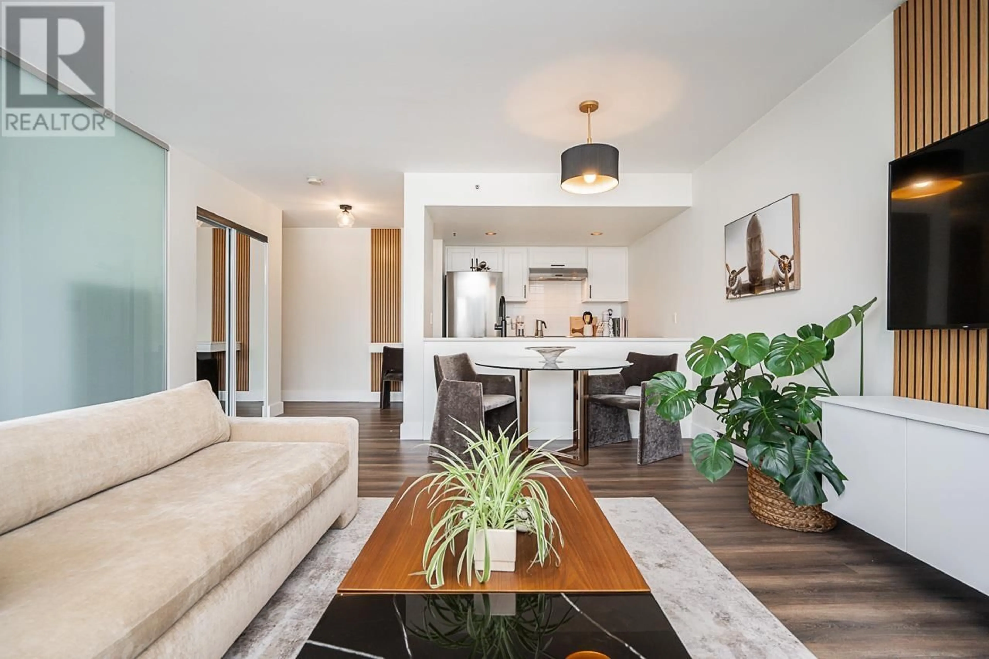 Living room with furniture, wood/laminate floor for 710 1060 ALBERNI STREET, Vancouver British Columbia V6E4K2