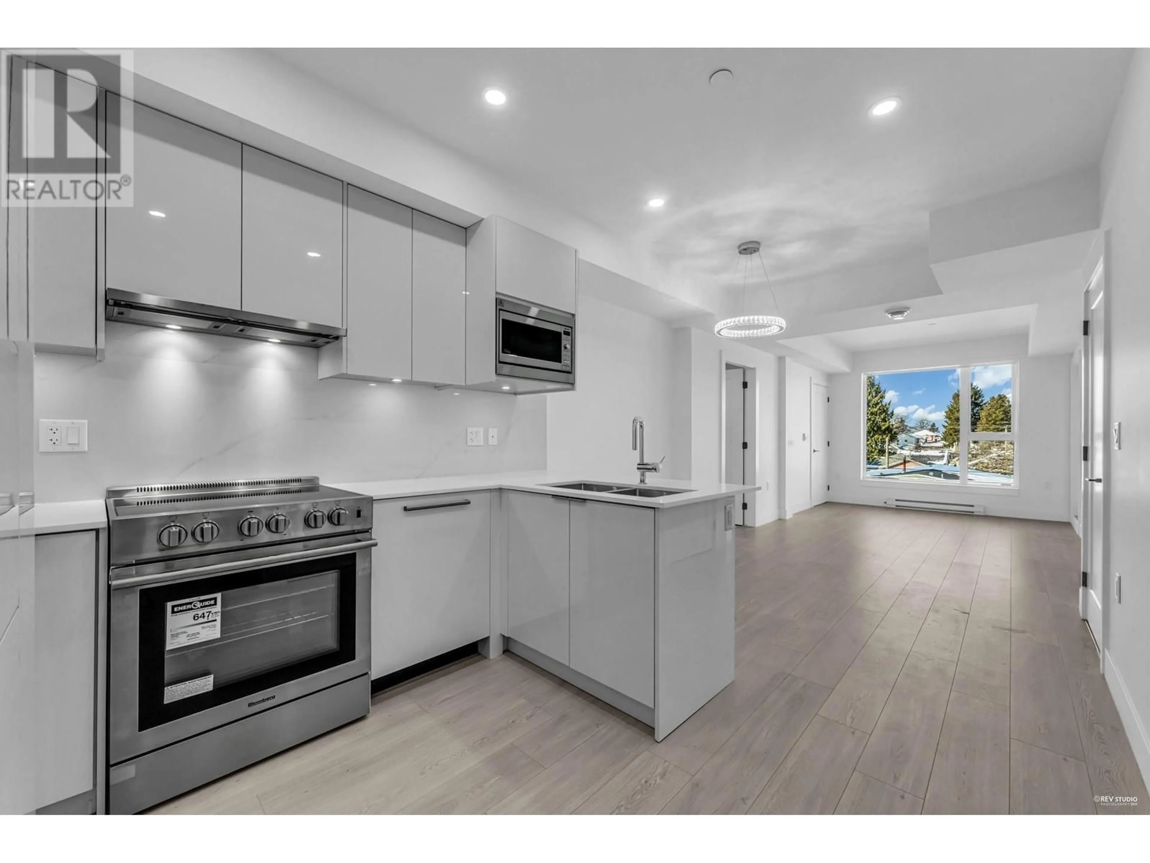 Open concept kitchen, ceramic/tile floor for 308 - 5399 JOYCE STREET, Vancouver British Columbia V5R4H3