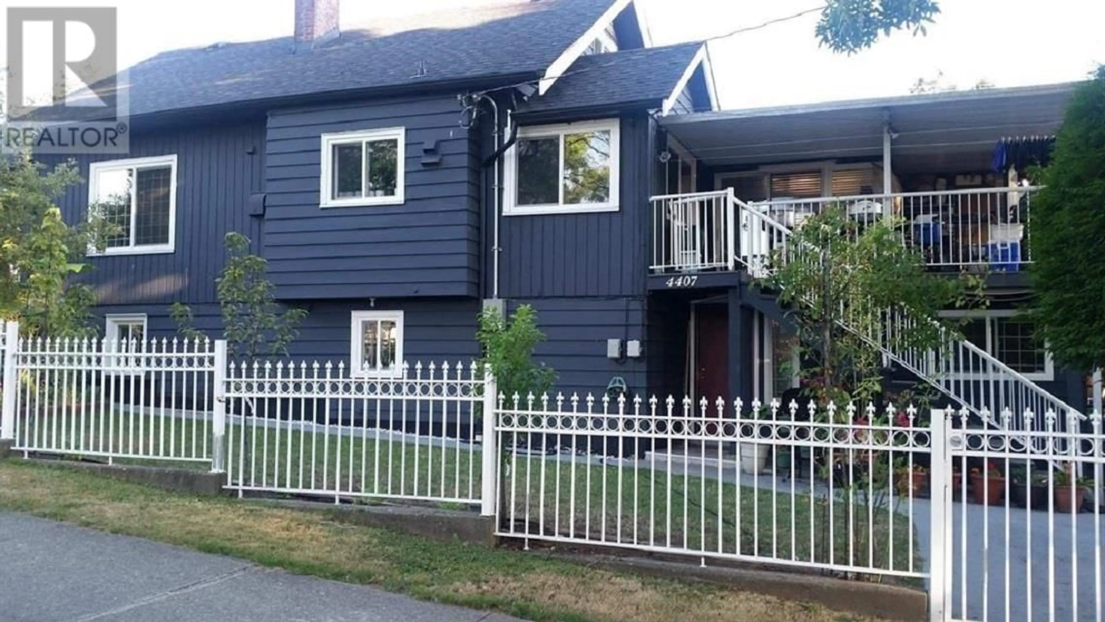 Home with vinyl exterior material, street for 4407 NANAIMO STREET, Vancouver British Columbia V5N5J2