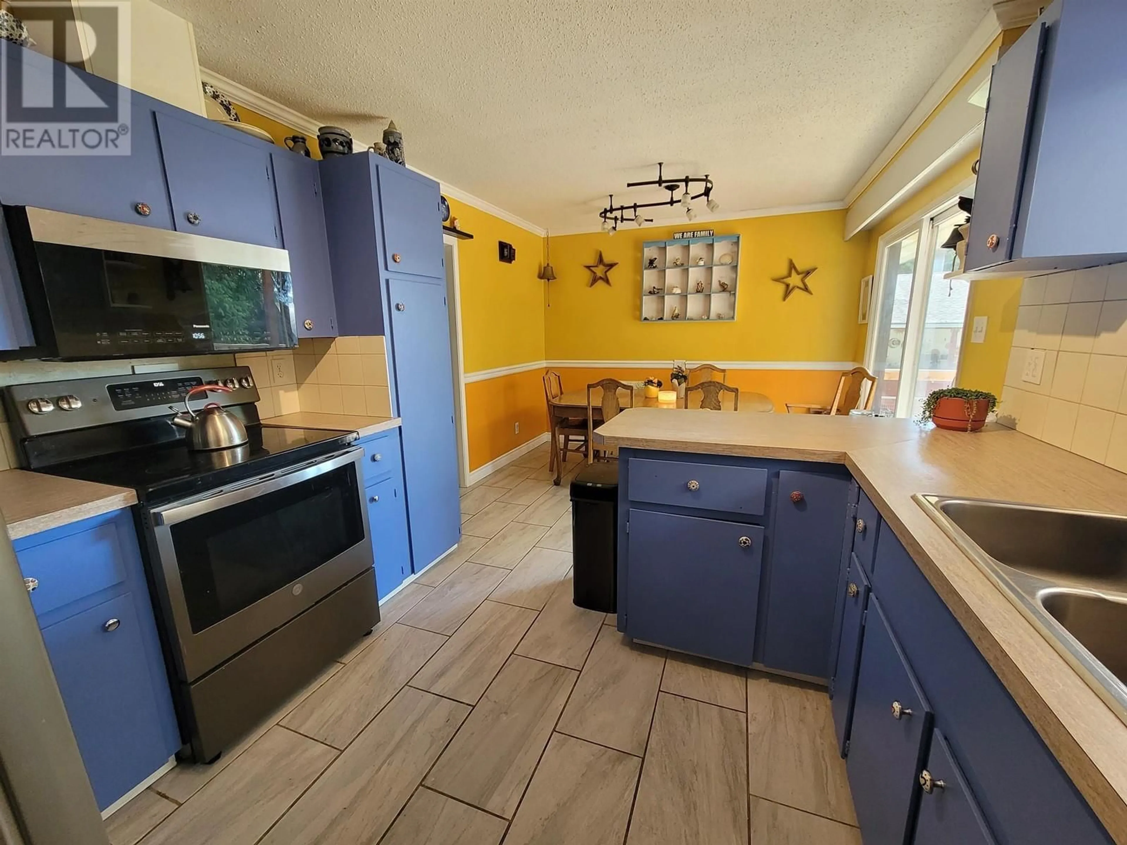 Standard kitchen, ceramic/tile floor for 4903 GAIR AVENUE, Terrace British Columbia V8G2K1