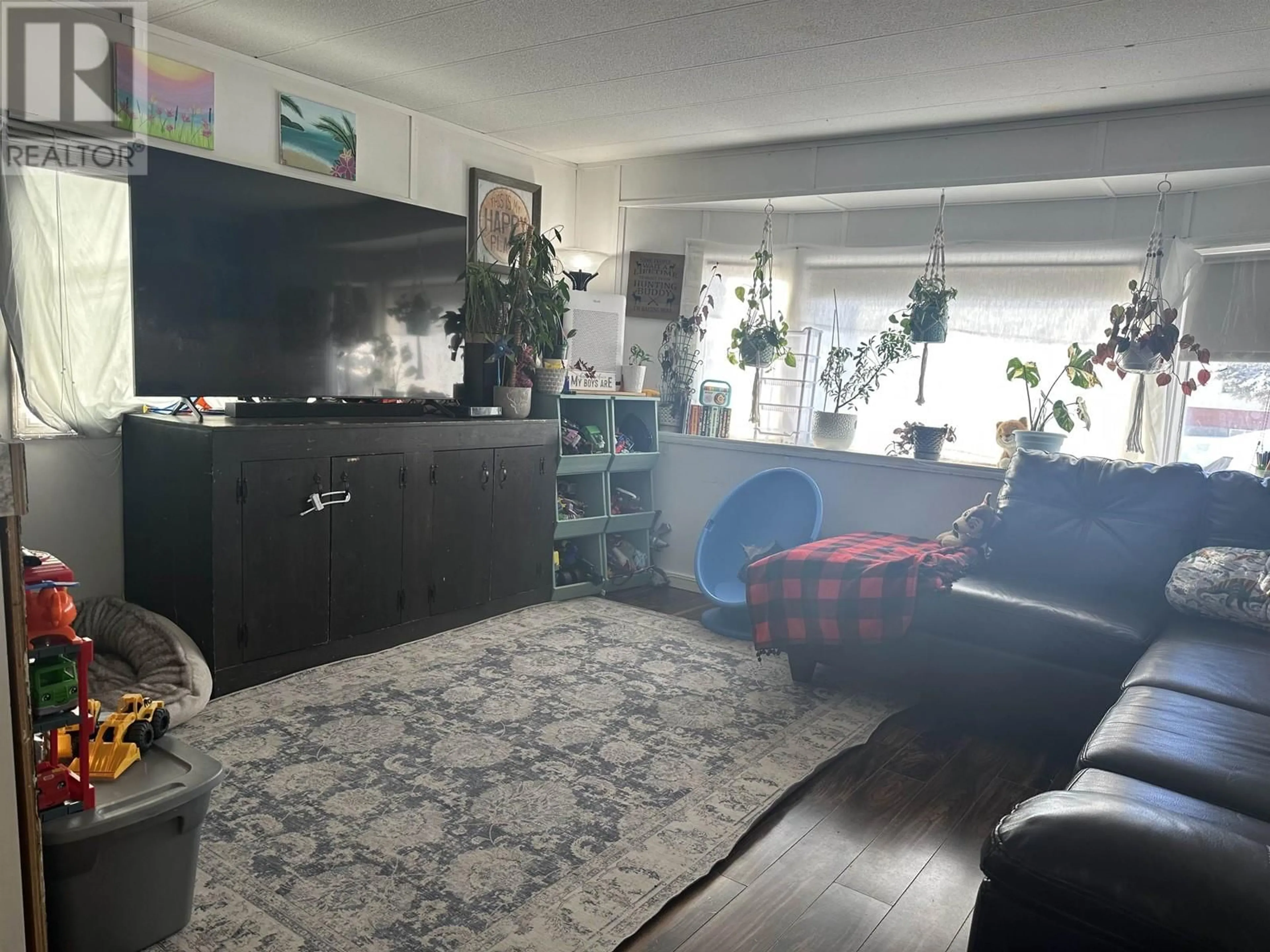 Living room with furniture, unknown for 8911 76 STREET, Fort St. John British Columbia V1J2Z8