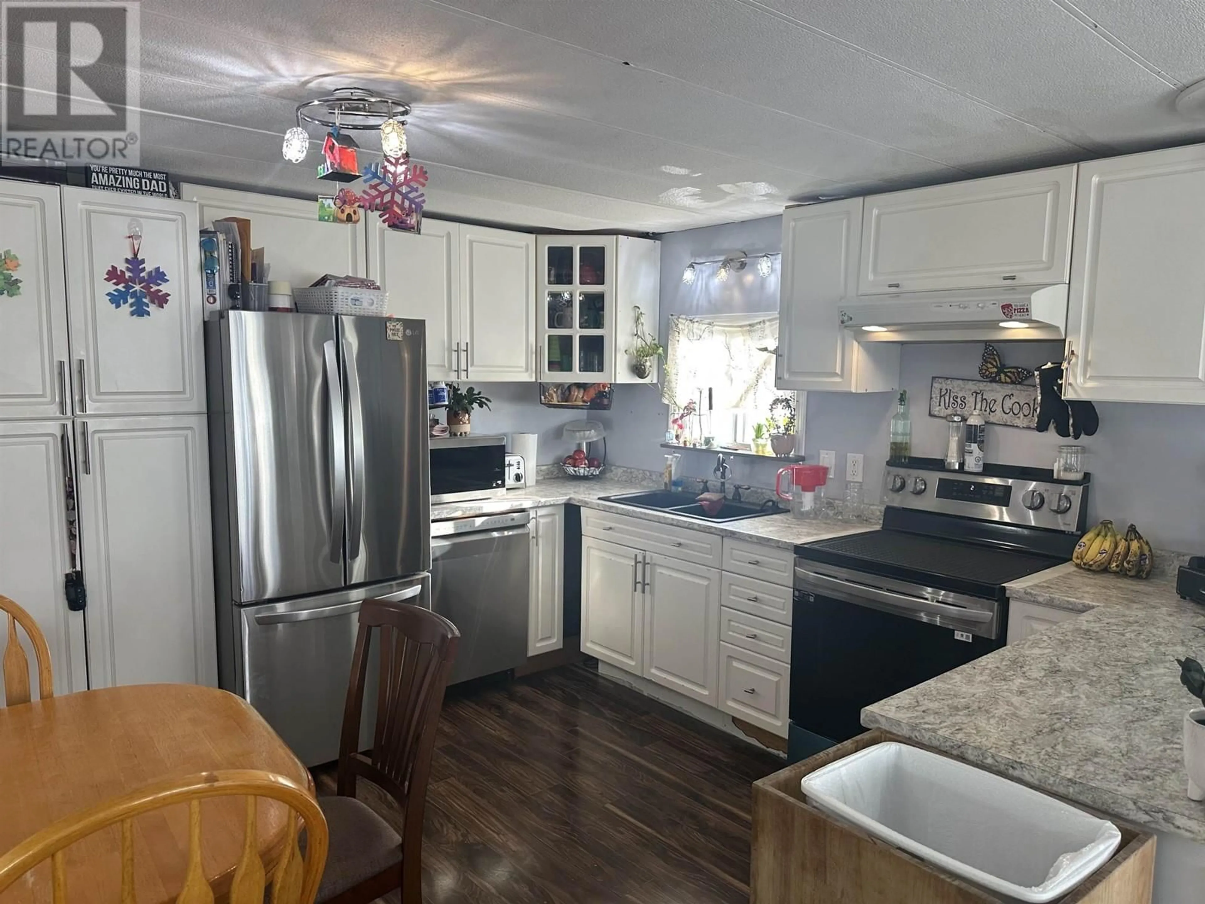 Open concept kitchen, unknown for 8911 76 STREET, Fort St. John British Columbia V1J2Z8