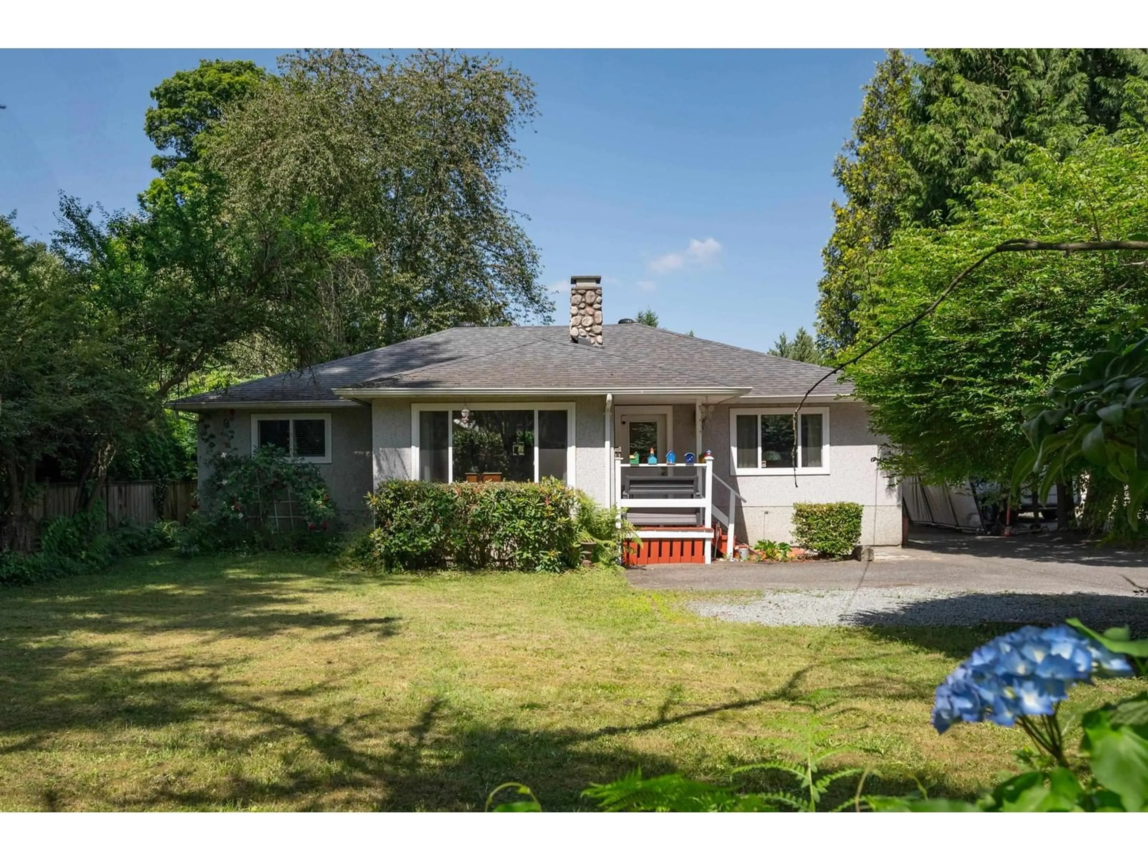 A pic from outside/outdoor area/front of a property/back of a property/a pic from drone, street for 8823 GLOVER ROAD, Langley British Columbia V1M1A0