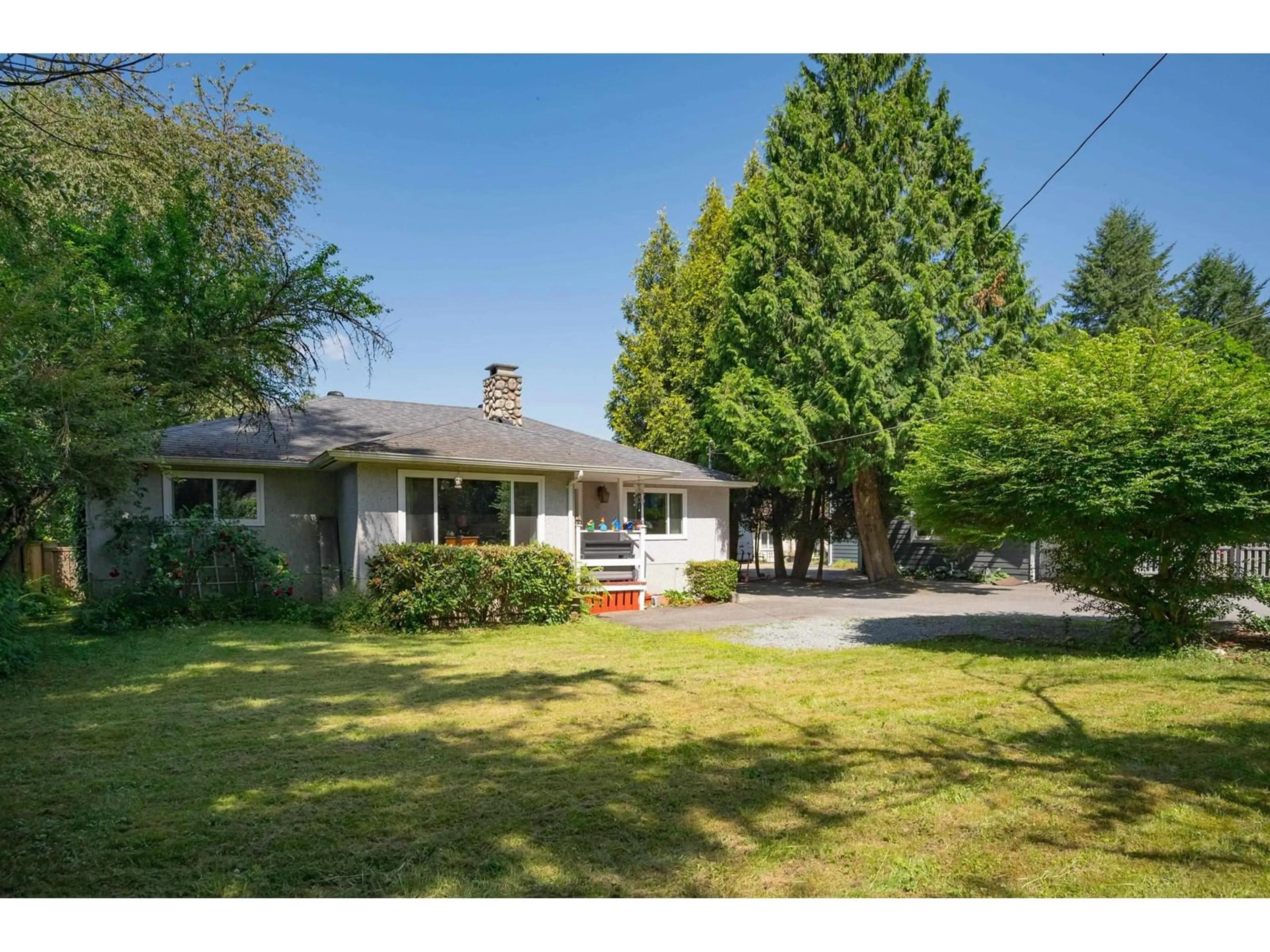 A pic from outside/outdoor area/front of a property/back of a property/a pic from drone, street for 8823 GLOVER ROAD, Langley British Columbia V1M1A0