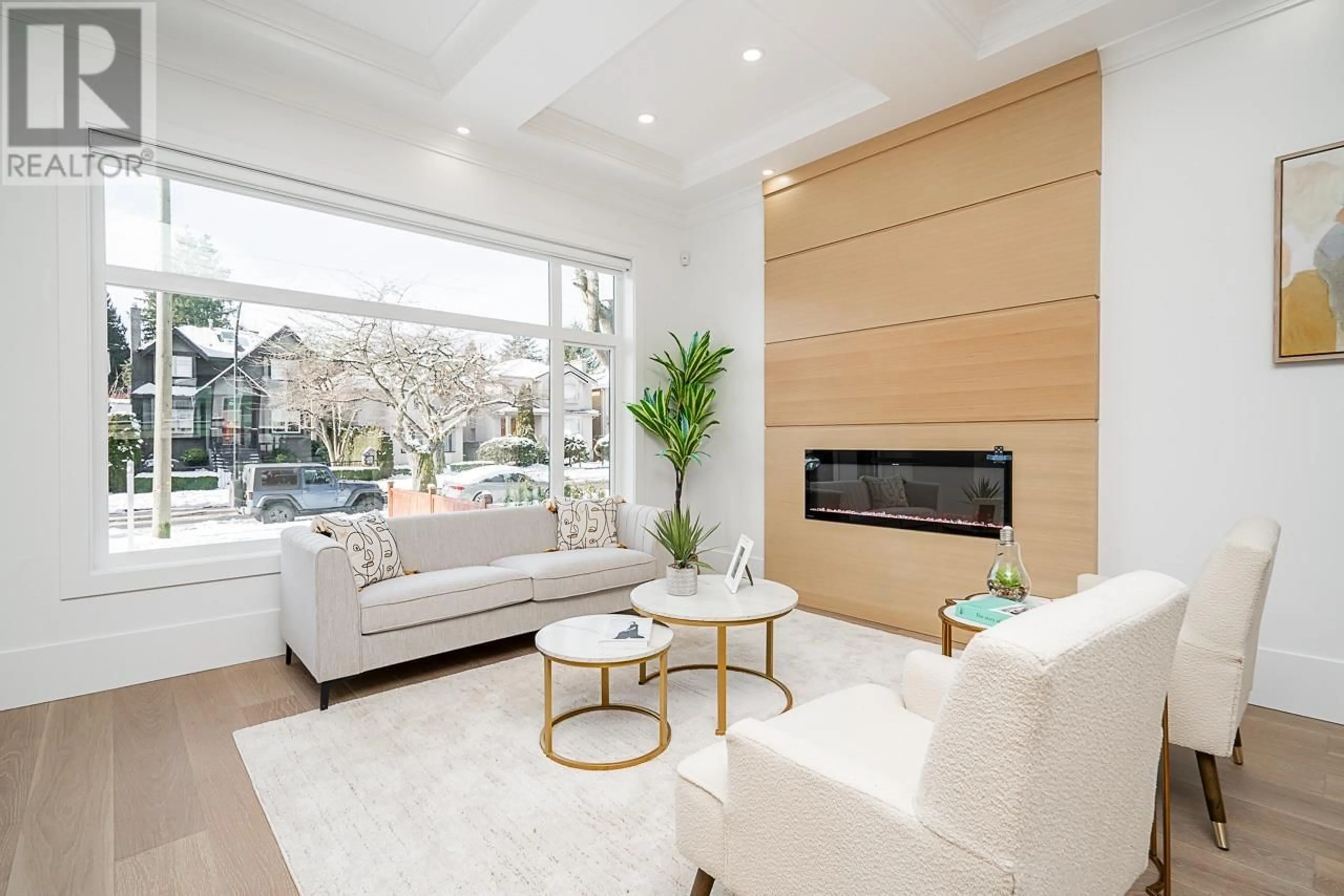 Living room with furniture, wood/laminate floor for 6210 LARCH STREET, Vancouver British Columbia V6M4E7