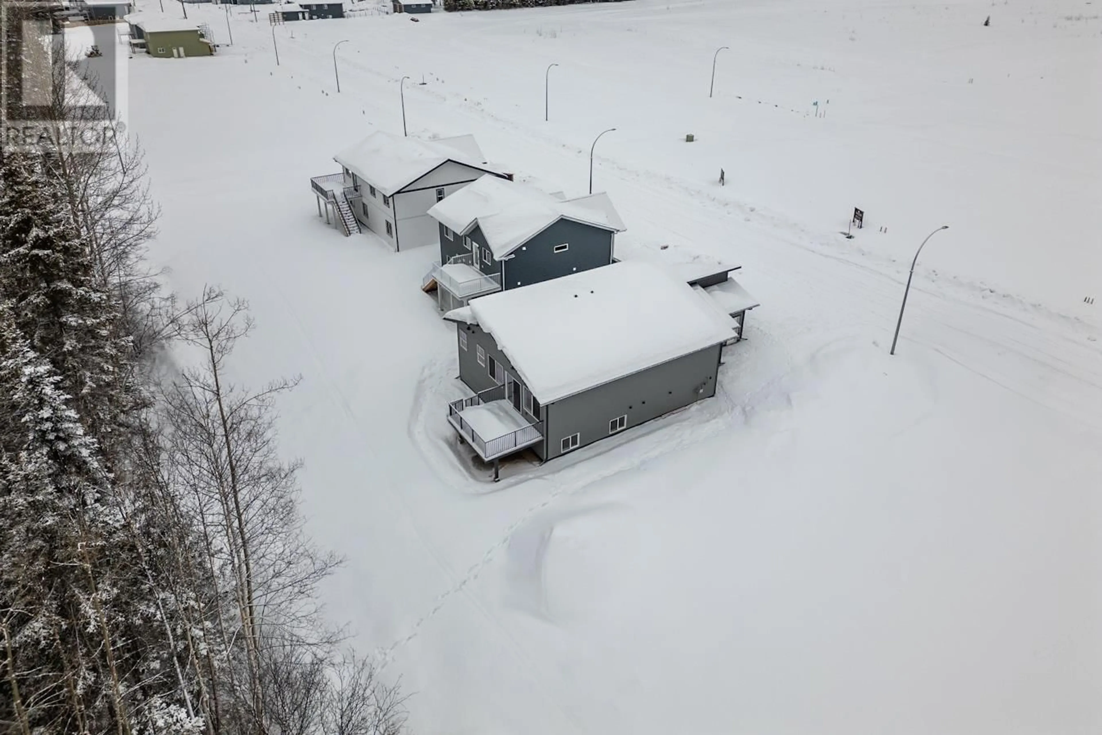 A pic from outside/outdoor area/front of a property/back of a property/a pic from drone, building for 7232 HILLU ROAD, Prince George British Columbia V2K0B4