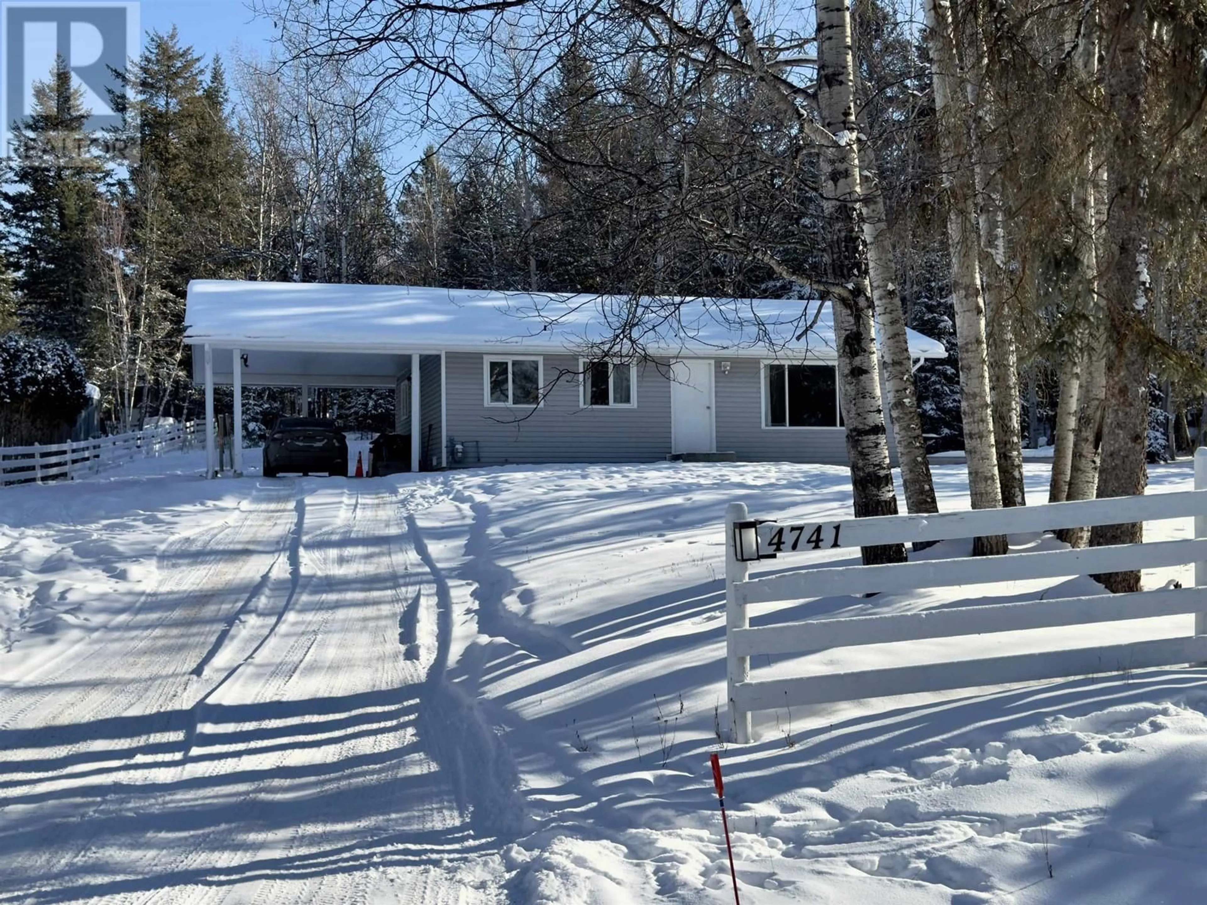 A pic from outside/outdoor area/front of a property/back of a property/a pic from drone, street for 4741 TELQUA DRIVE, 100 Mile House British Columbia V0K2Z0