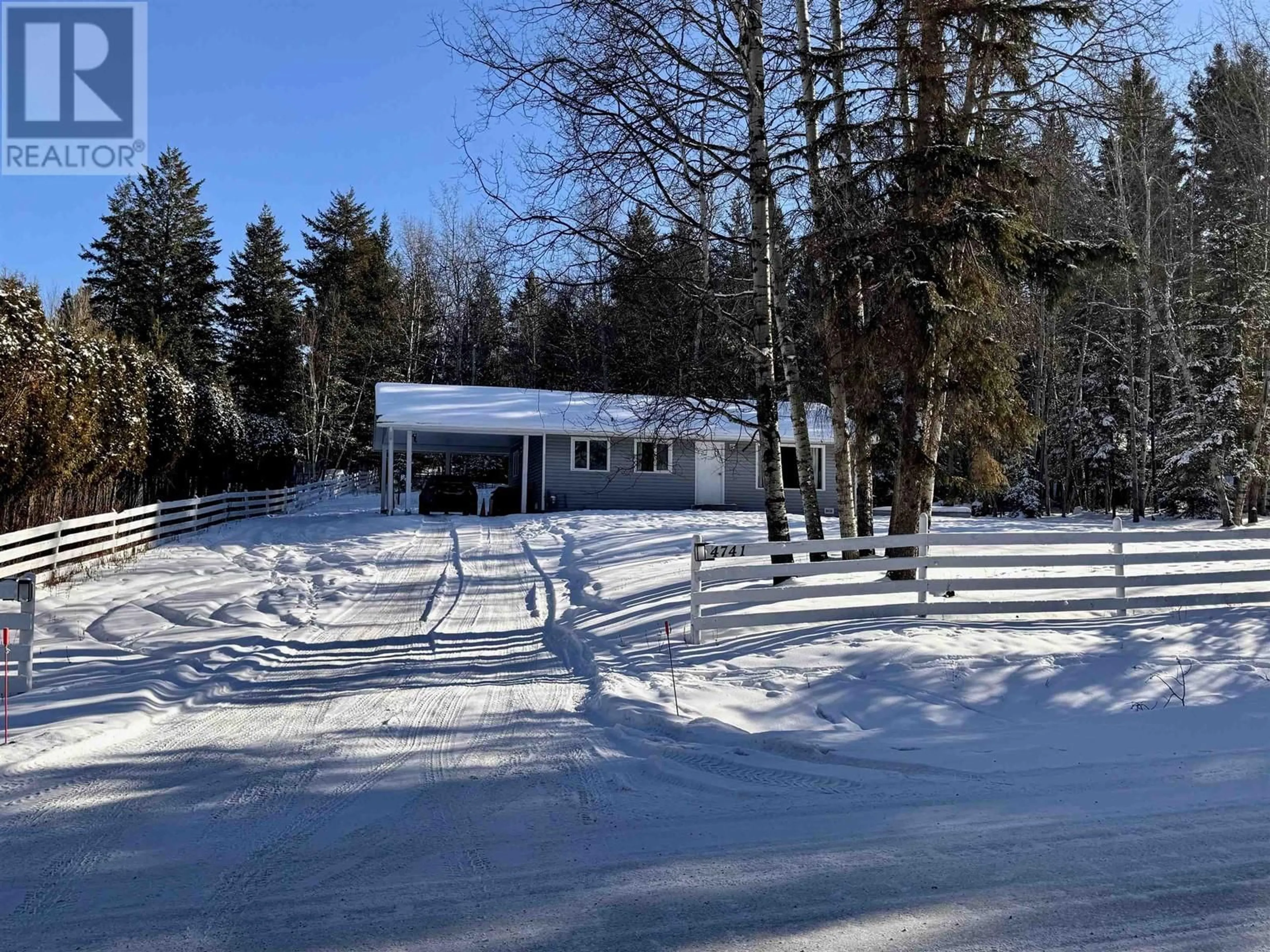 A pic from outside/outdoor area/front of a property/back of a property/a pic from drone, street for 4741 TELQUA DRIVE, 100 Mile House British Columbia V0K2Z0