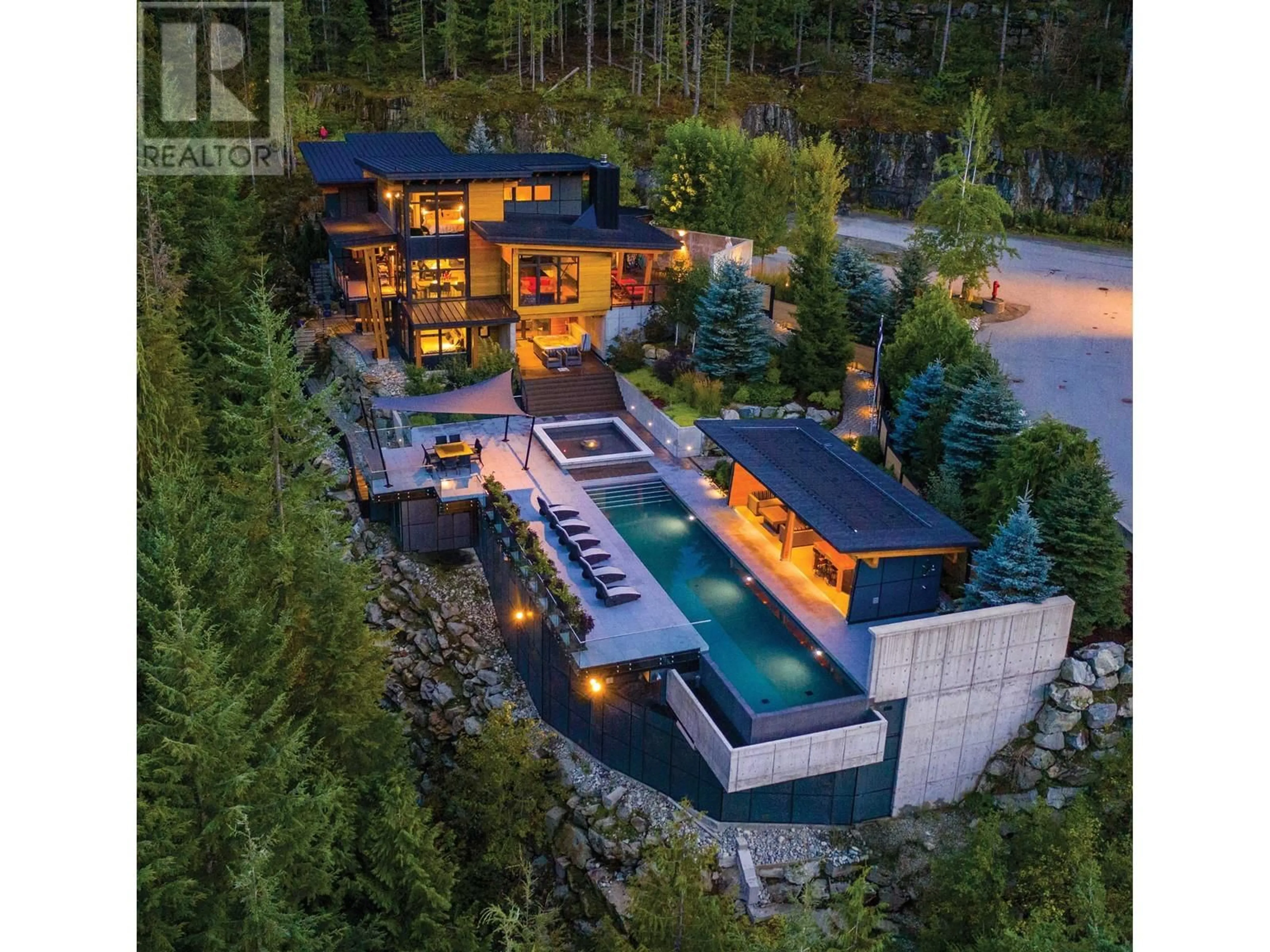 A pic from outside/outdoor area/front of a property/back of a property/a pic from drone, water/lake/river/ocean view for 1563 SPRING CREEK DRIVE, Whistler British Columbia V8E0A2