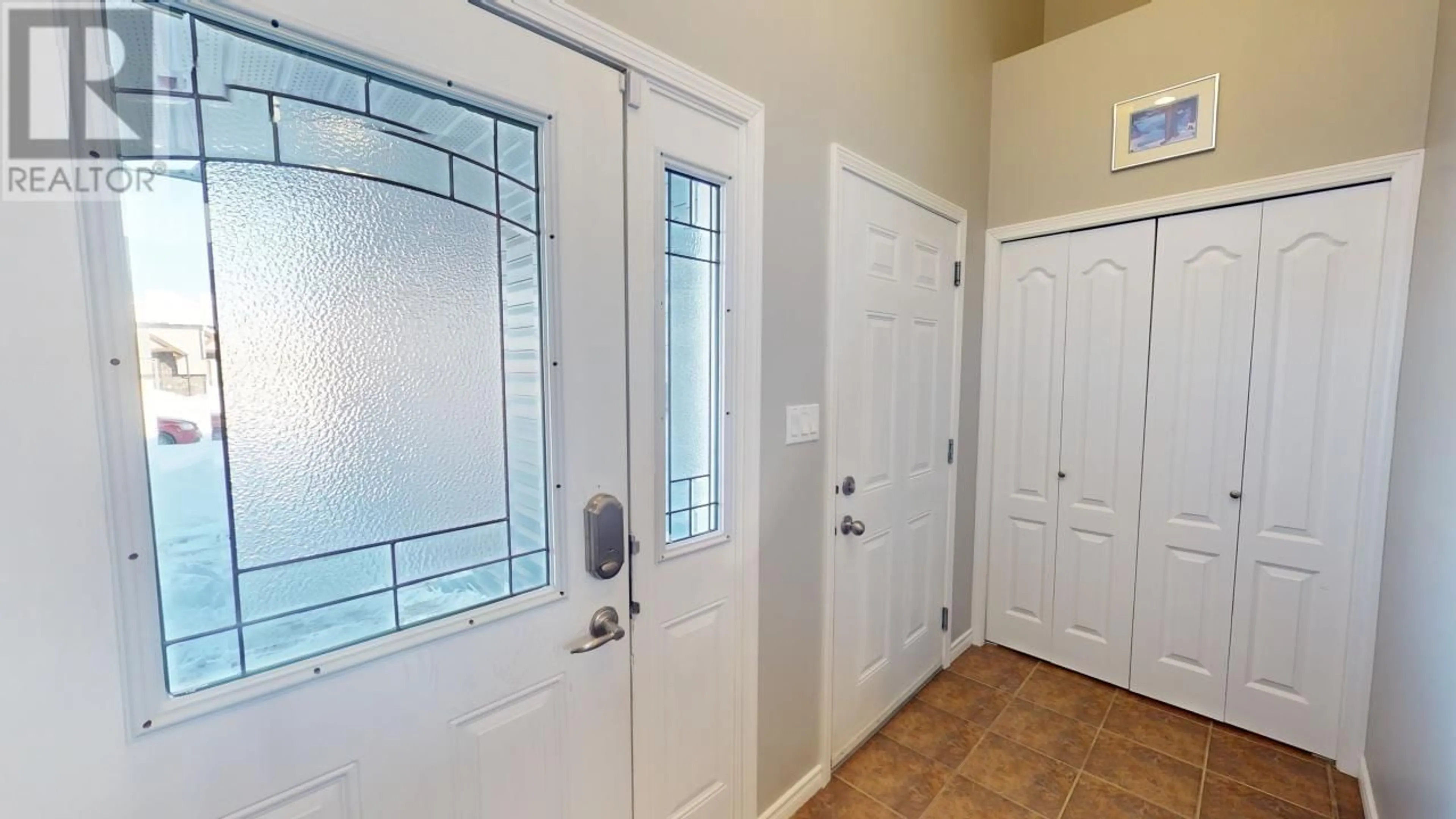 Indoor entryway for 8907 118A AVENUE, Fort St. John British Columbia V1J0H8