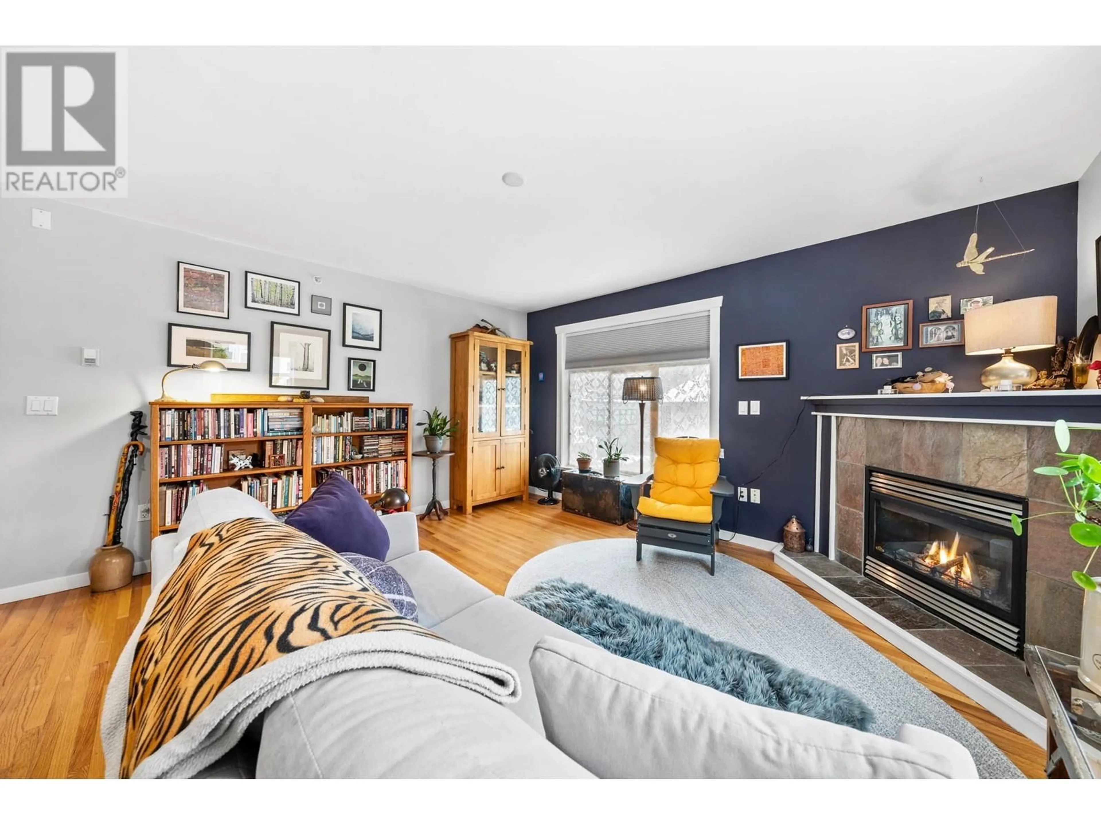 Living room with furniture, wood/laminate floor for 201 4272 ALBERT STREET, Burnaby British Columbia V5C2E8