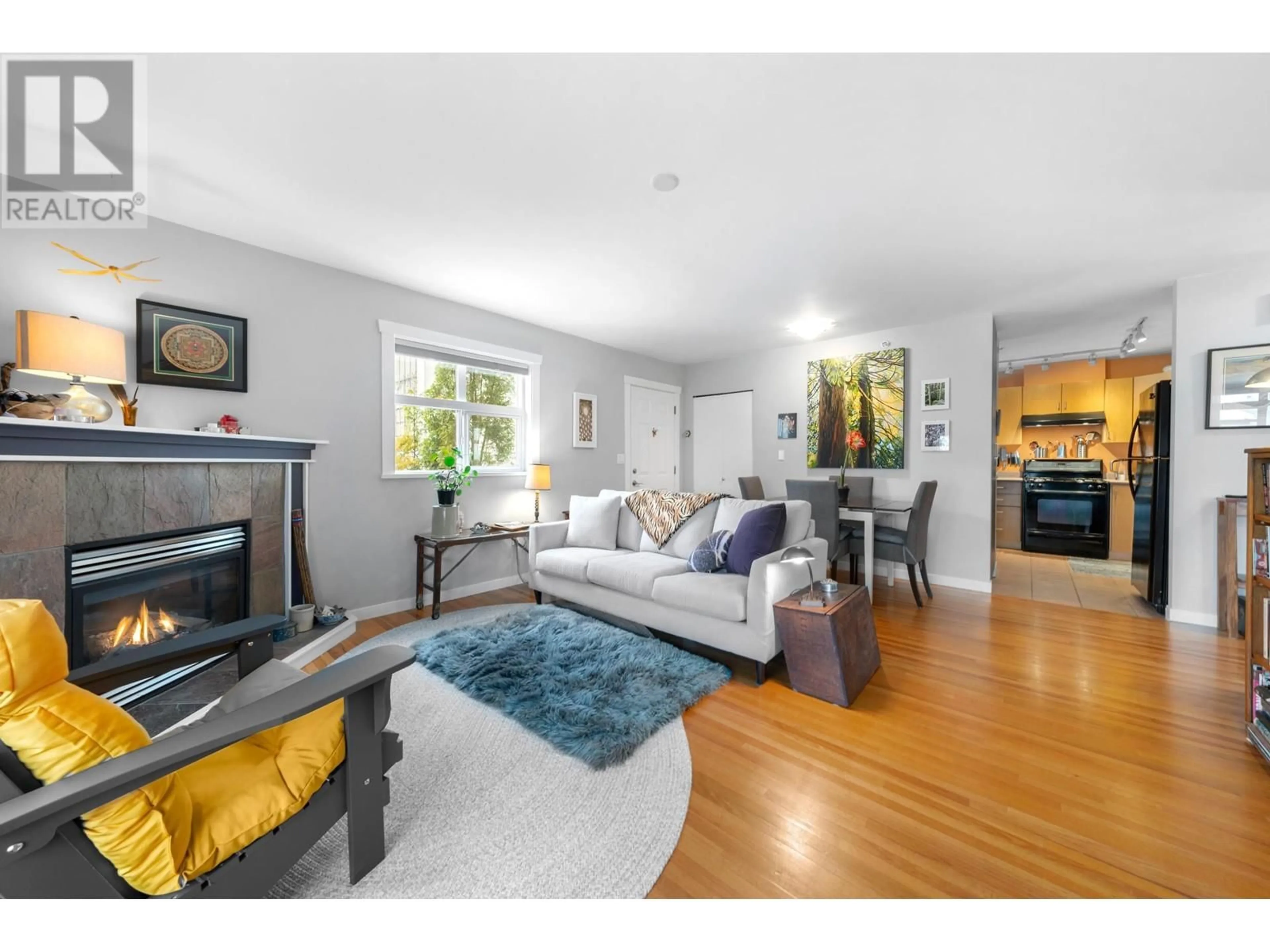 Living room with furniture, wood/laminate floor for 201 4272 ALBERT STREET, Burnaby British Columbia V5C2E8