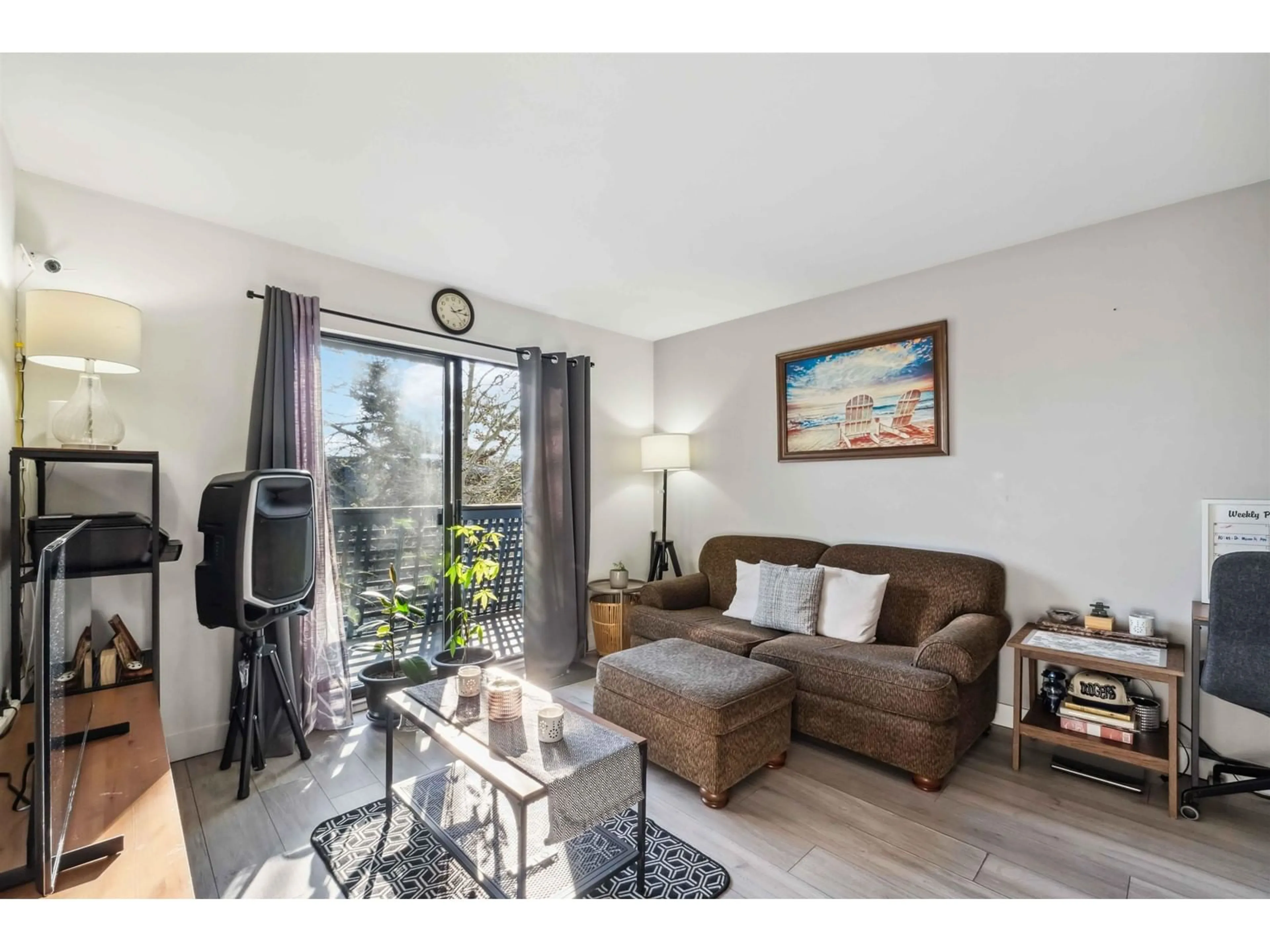 Living room with furniture, wood/laminate floor for 311 5906 176A STREET, Surrey British Columbia V3S4H7