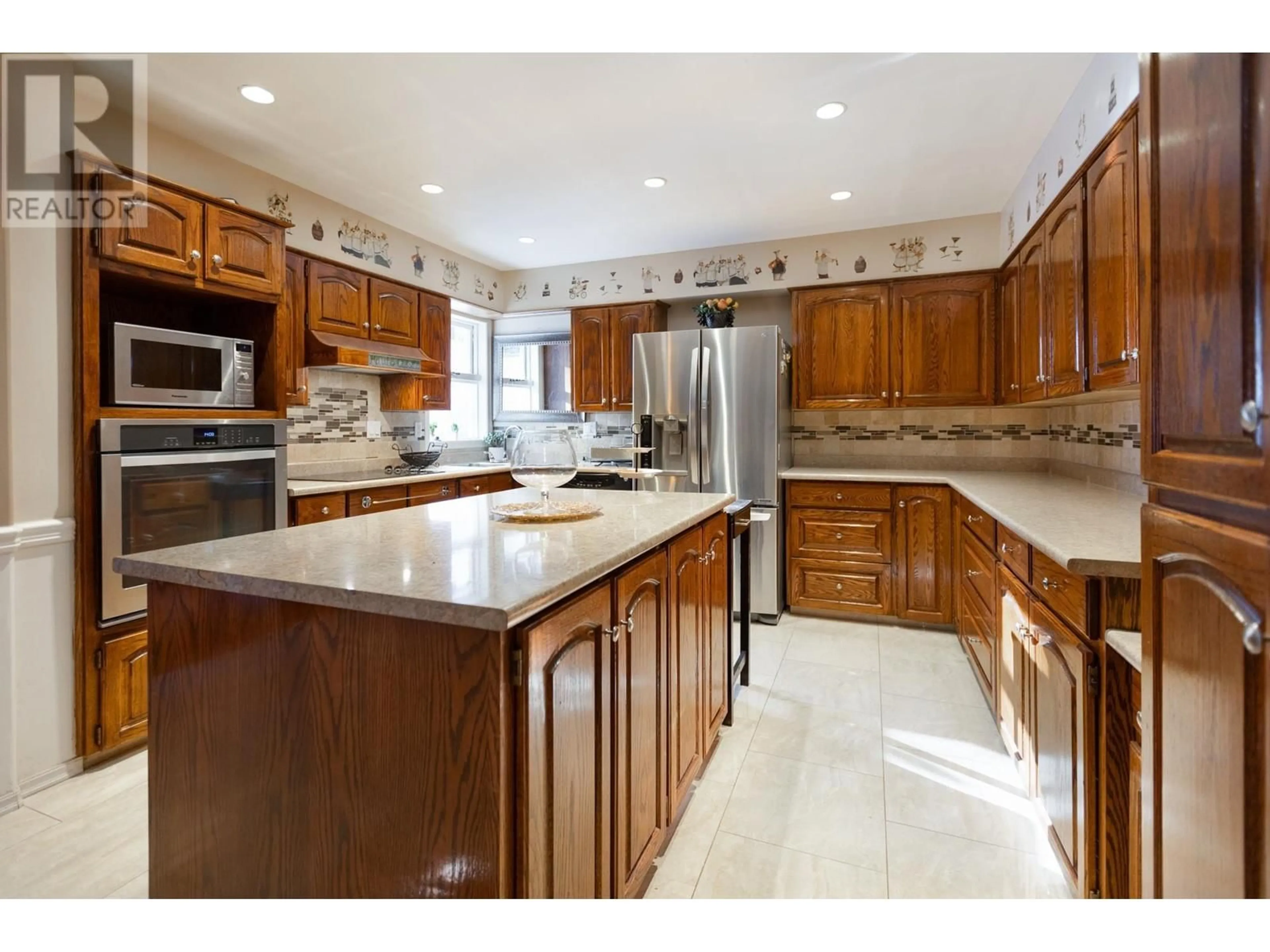 Open concept kitchen, ceramic/tile floor for 215 HUNTLEY PLACE, Prince George British Columbia V2M6W1