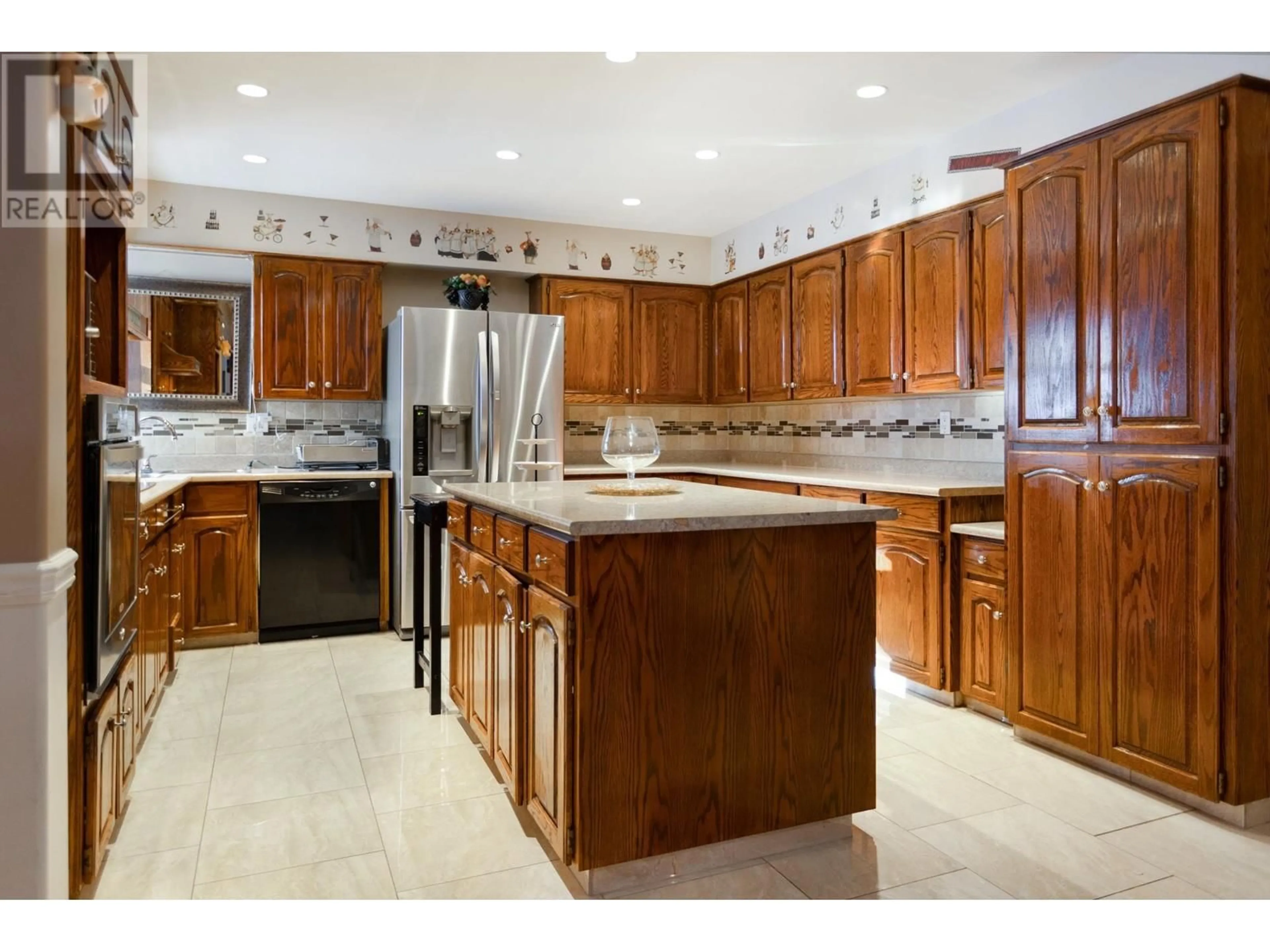 Open concept kitchen, ceramic/tile floor for 215 HUNTLEY PLACE, Prince George British Columbia V2M6W1