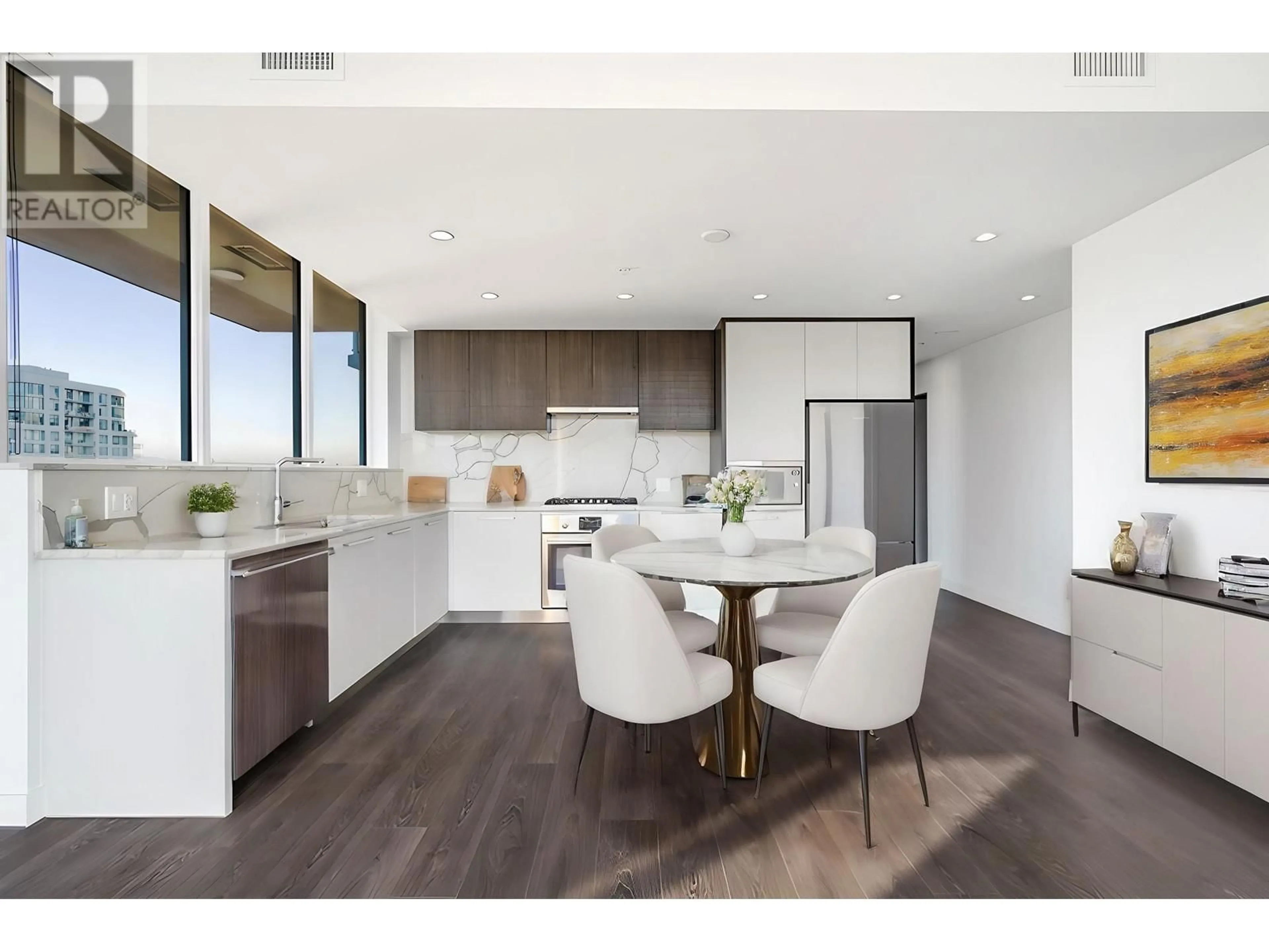 Open concept kitchen, wood/laminate floor for 1904 - 567 CLARKE ROAD, Coquitlam British Columbia V3J0K7