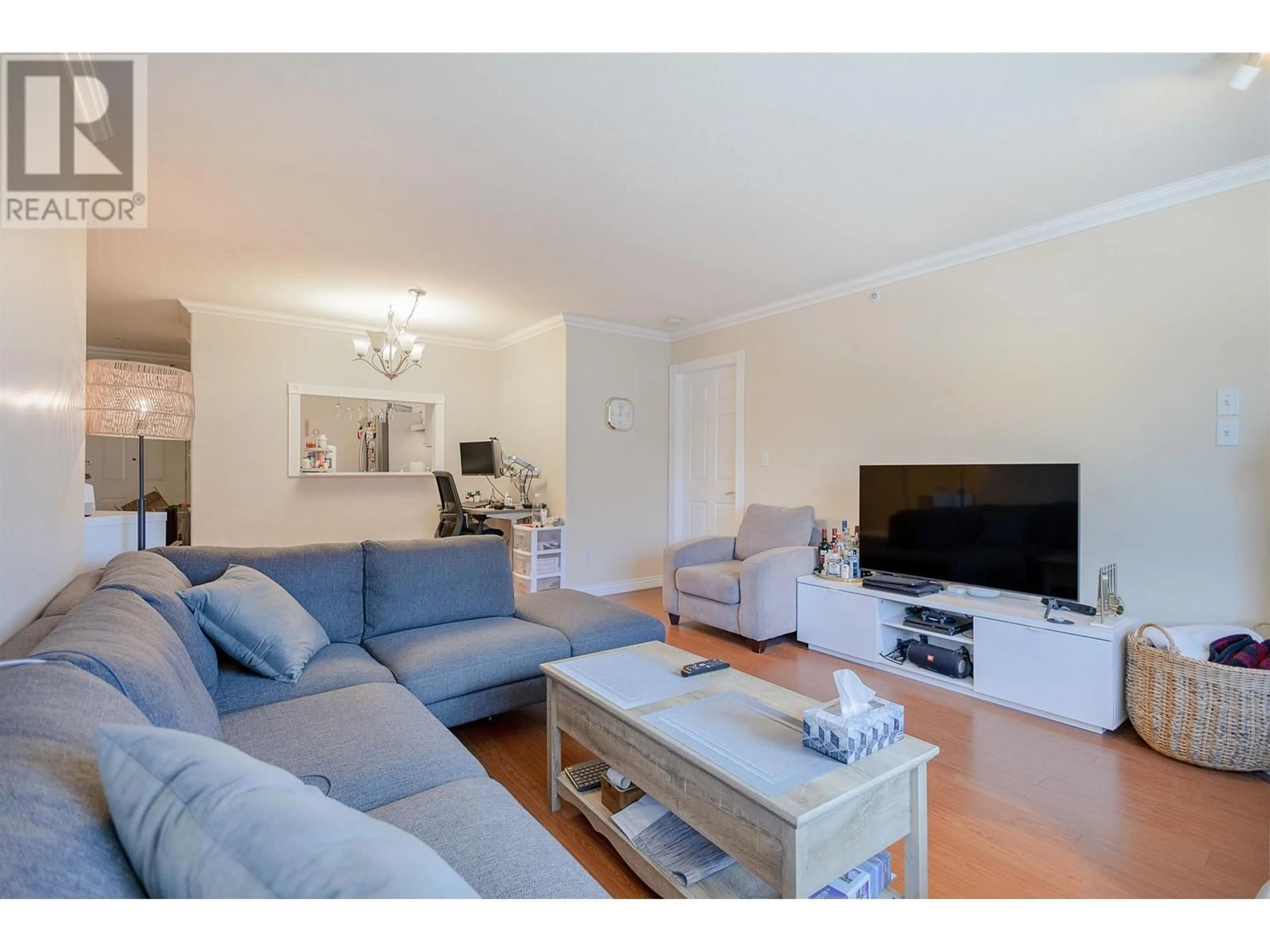 Living room with furniture, wood/laminate floor for PH8 2405 KAMLOOPS STREET, Vancouver British Columbia V5M4V6