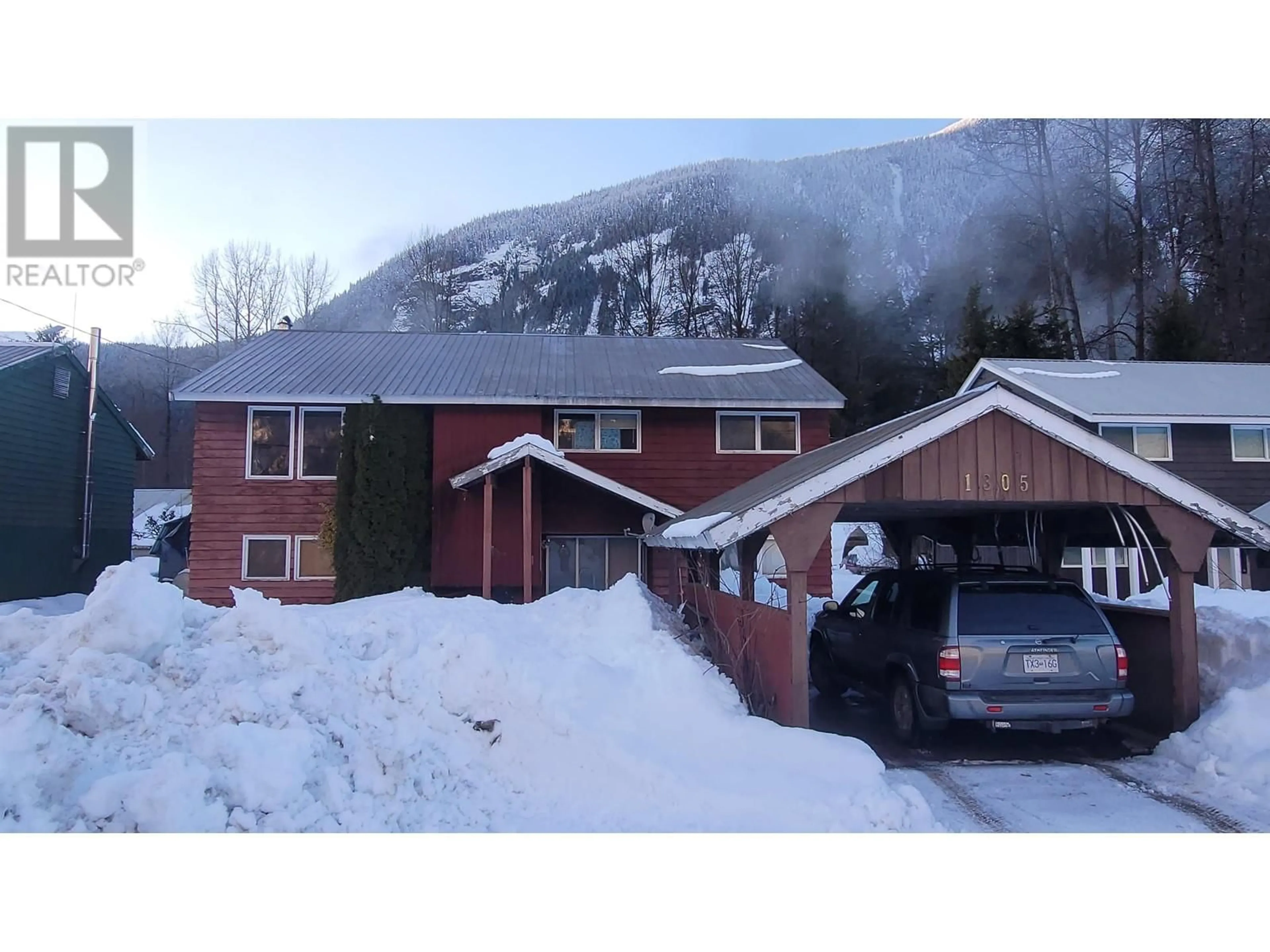 A pic from outside/outdoor area/front of a property/back of a property/a pic from drone, mountain view for 1305 RAVEN STREET, Stewart British Columbia V0T1W0