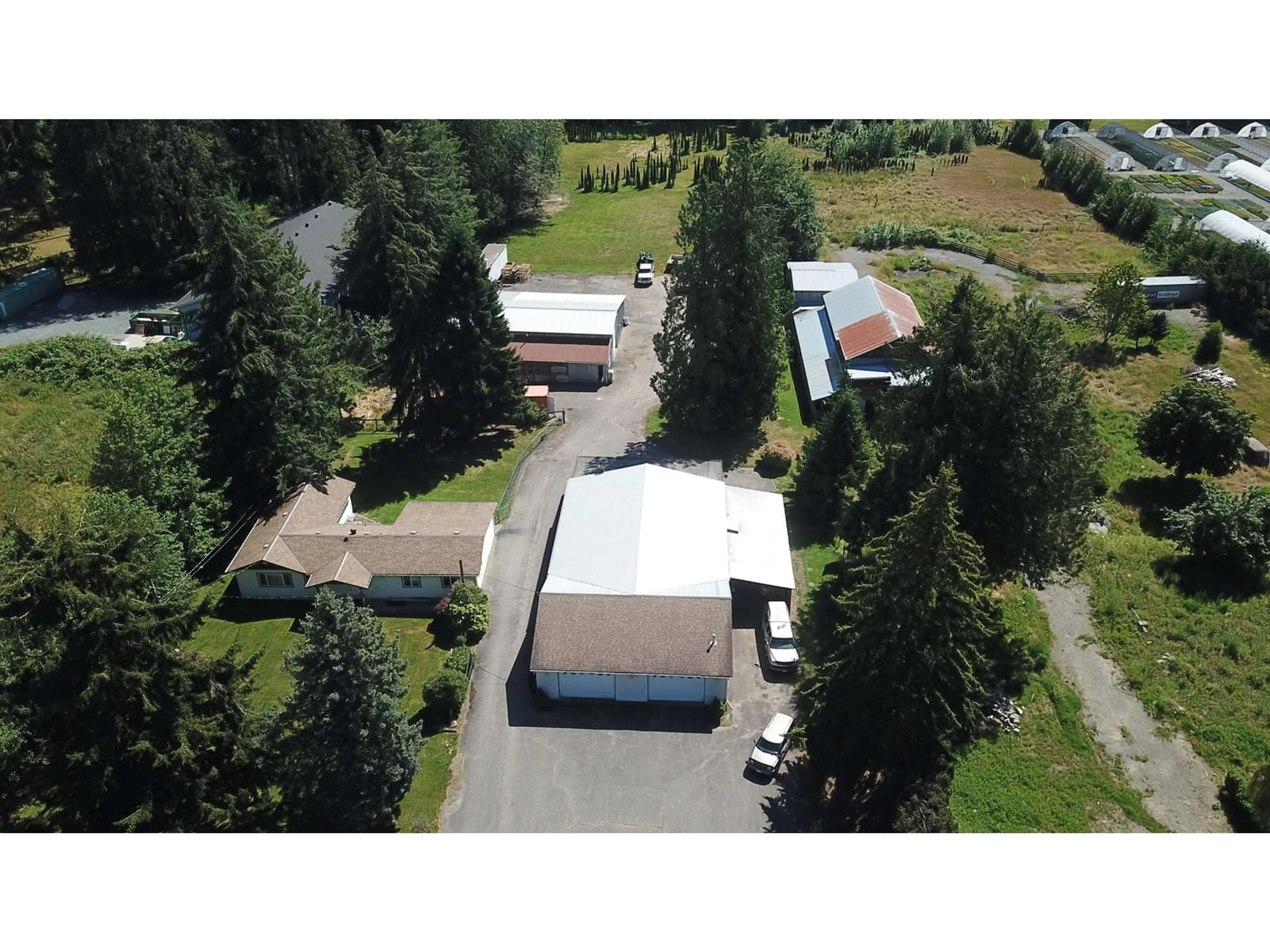 A pic from outside/outdoor area/front of a property/back of a property/a pic from drone, mountain view for 7836 BRADNER ROAD, Abbotsford British Columbia V4X2B6