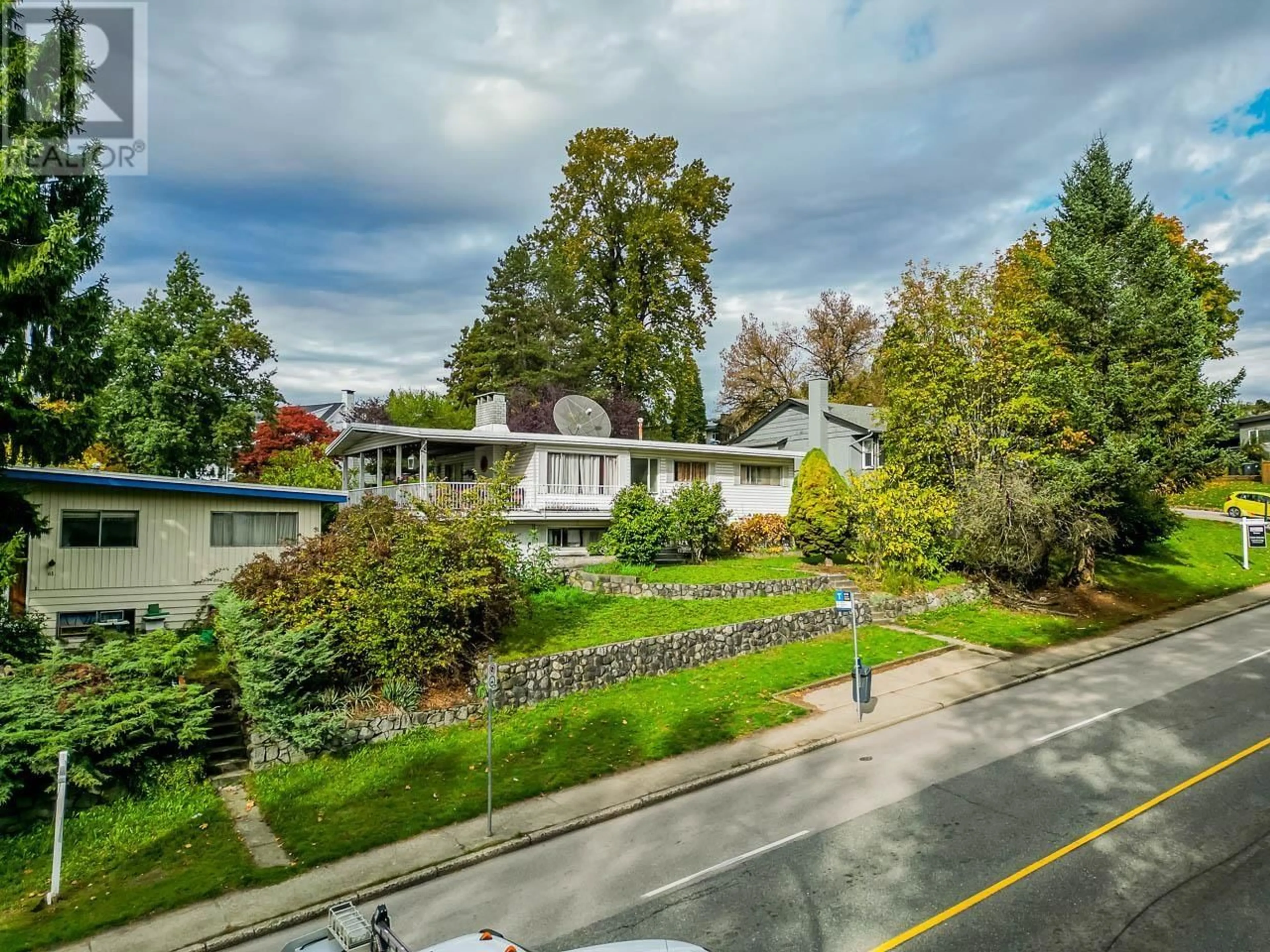 A pic from outside/outdoor area/front of a property/back of a property/a pic from drone, street for 65 EIGHTH AVENUE, New Westminster British Columbia V3L4J4