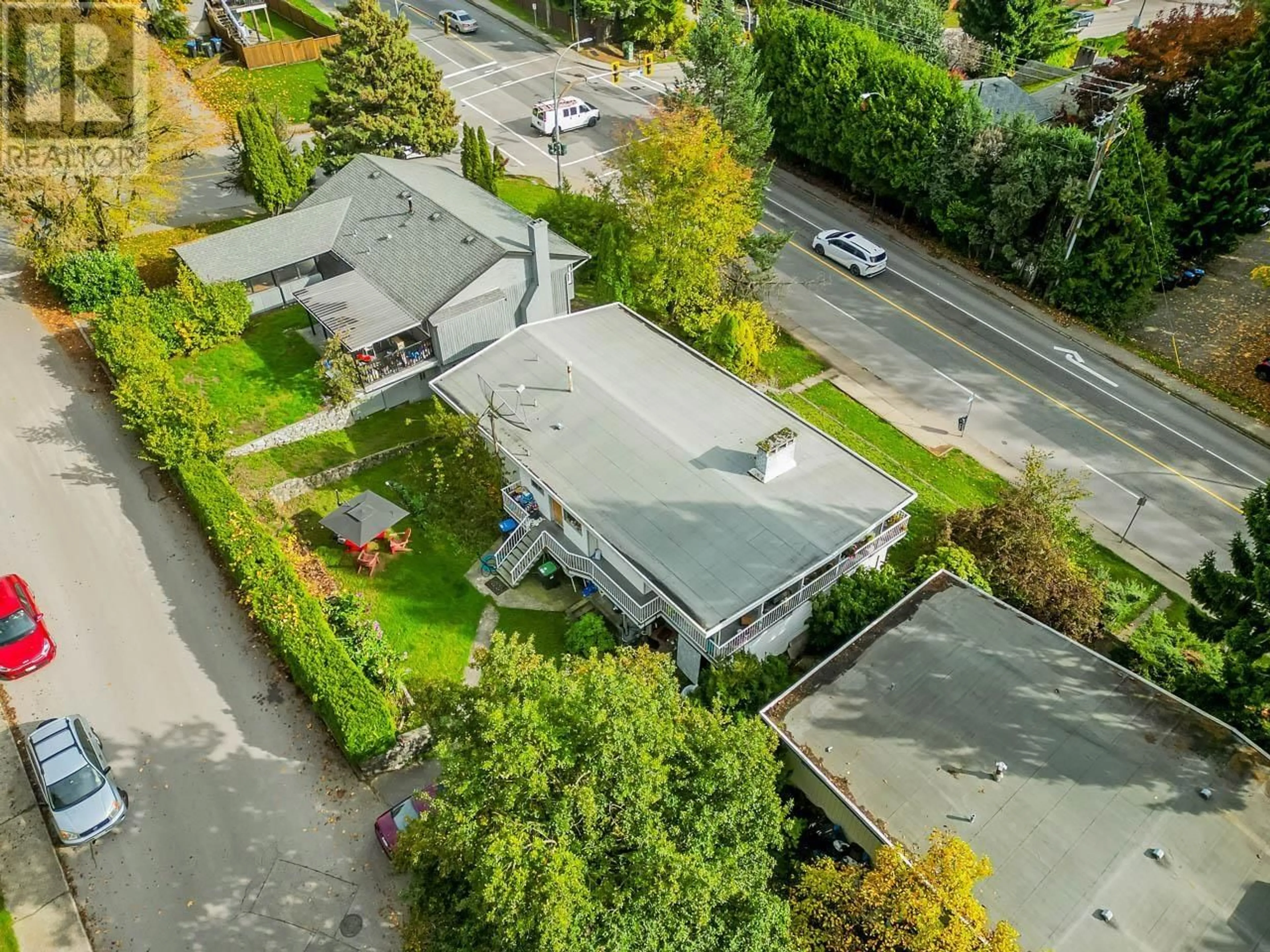 A pic from outside/outdoor area/front of a property/back of a property/a pic from drone, street for 65 EIGHTH AVENUE, New Westminster British Columbia V3L4J4