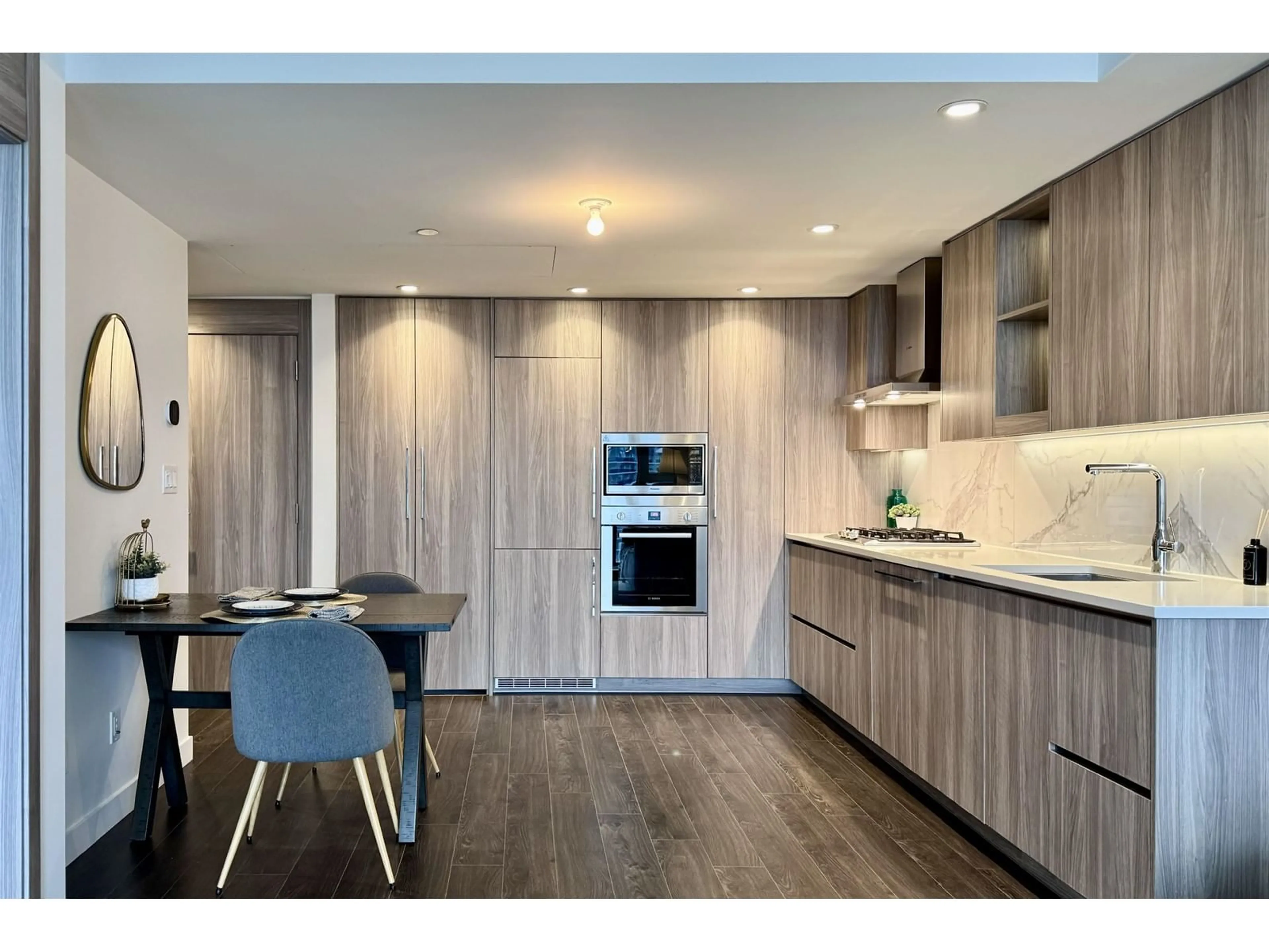 Open concept kitchen, wood/laminate floor for 2501 9887 WHALLEY BOULEVARD, Surrey British Columbia V3T0P4