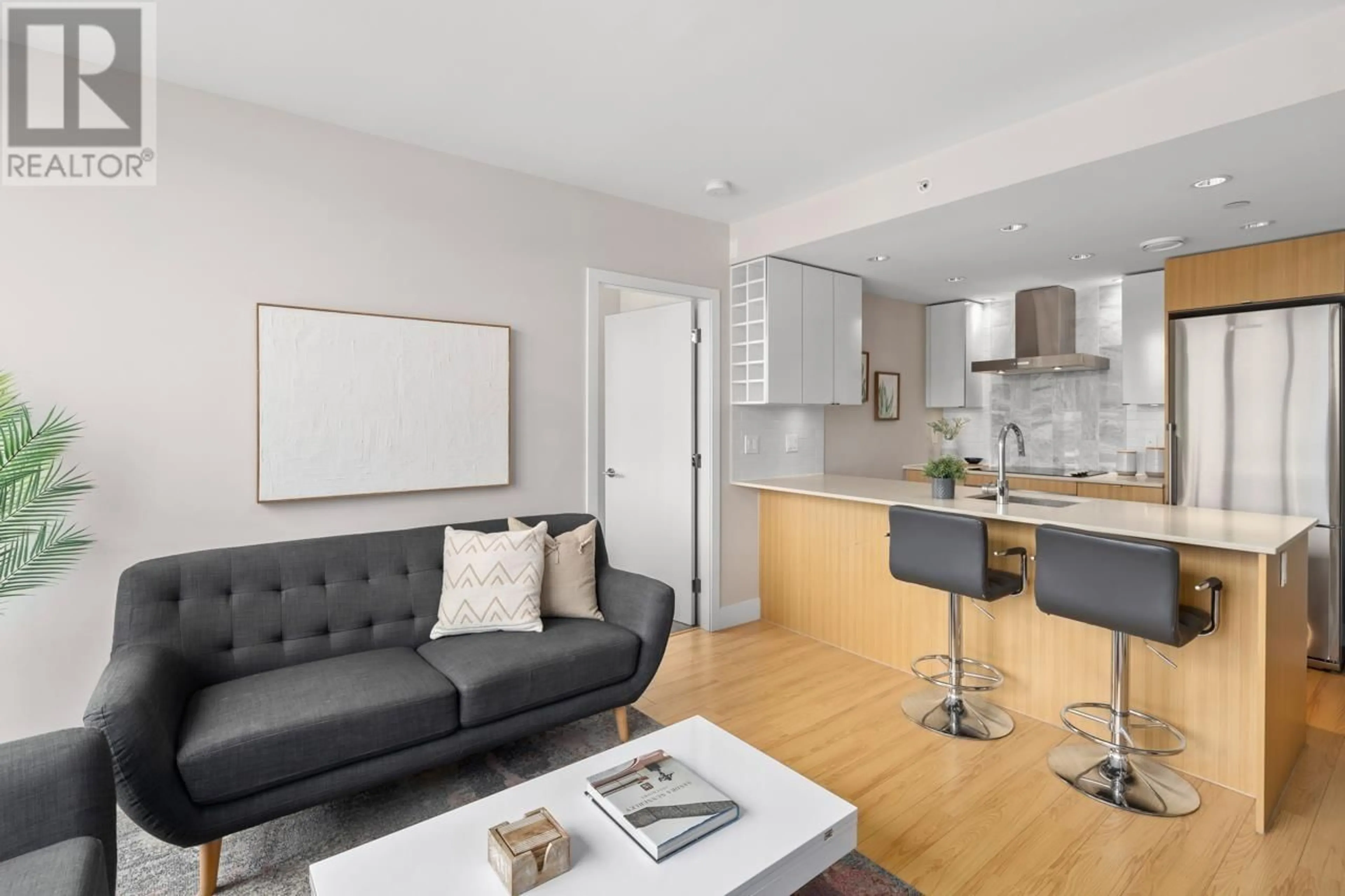 Living room with furniture, wood/laminate floor for 809 159 W 2ND AVENUE, Vancouver British Columbia V5Y0L8