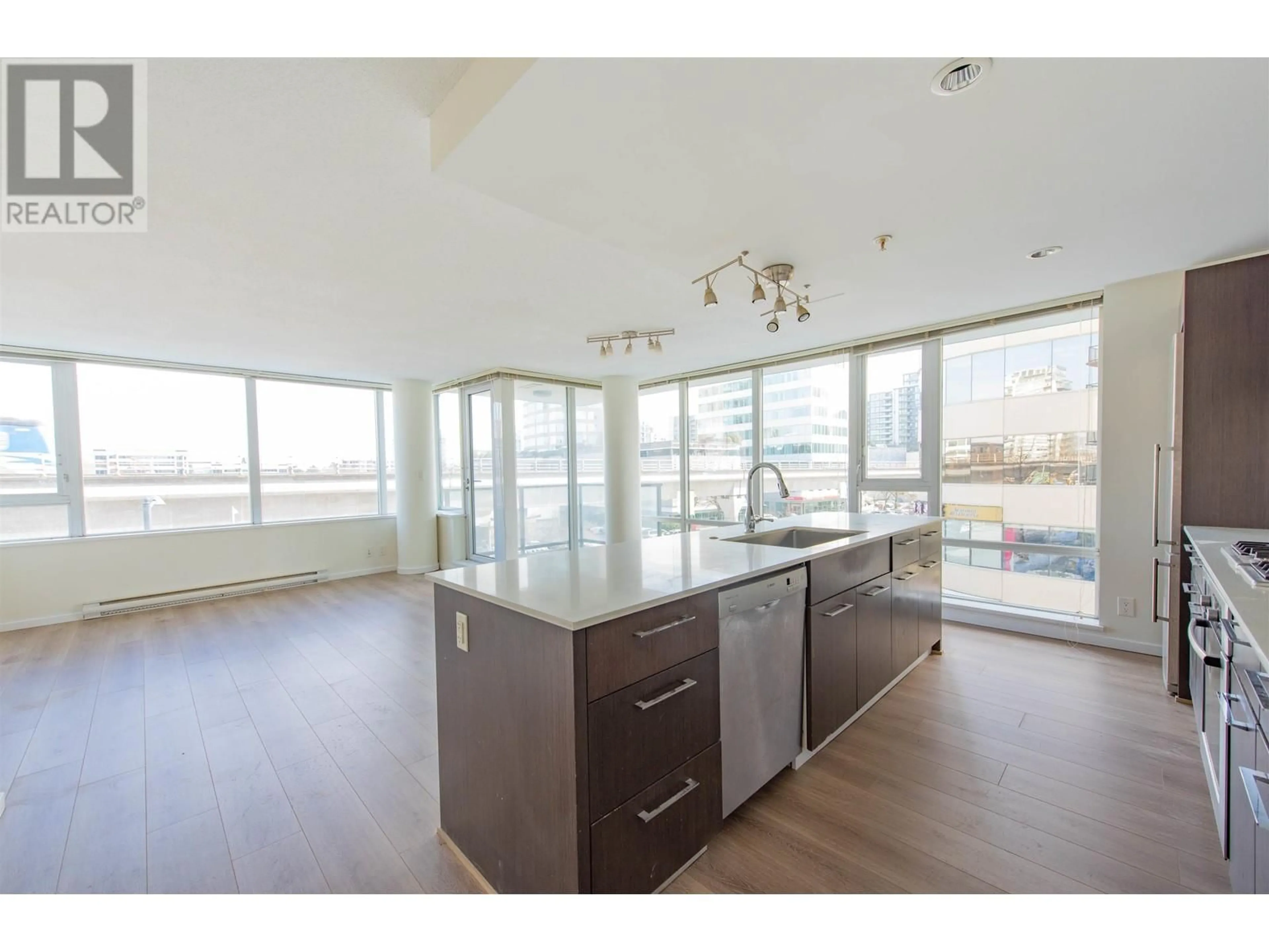 Open concept kitchen, wood/laminate floor for 511 - 7988 ACKROYD ROAD, Richmond British Columbia V6X0K6