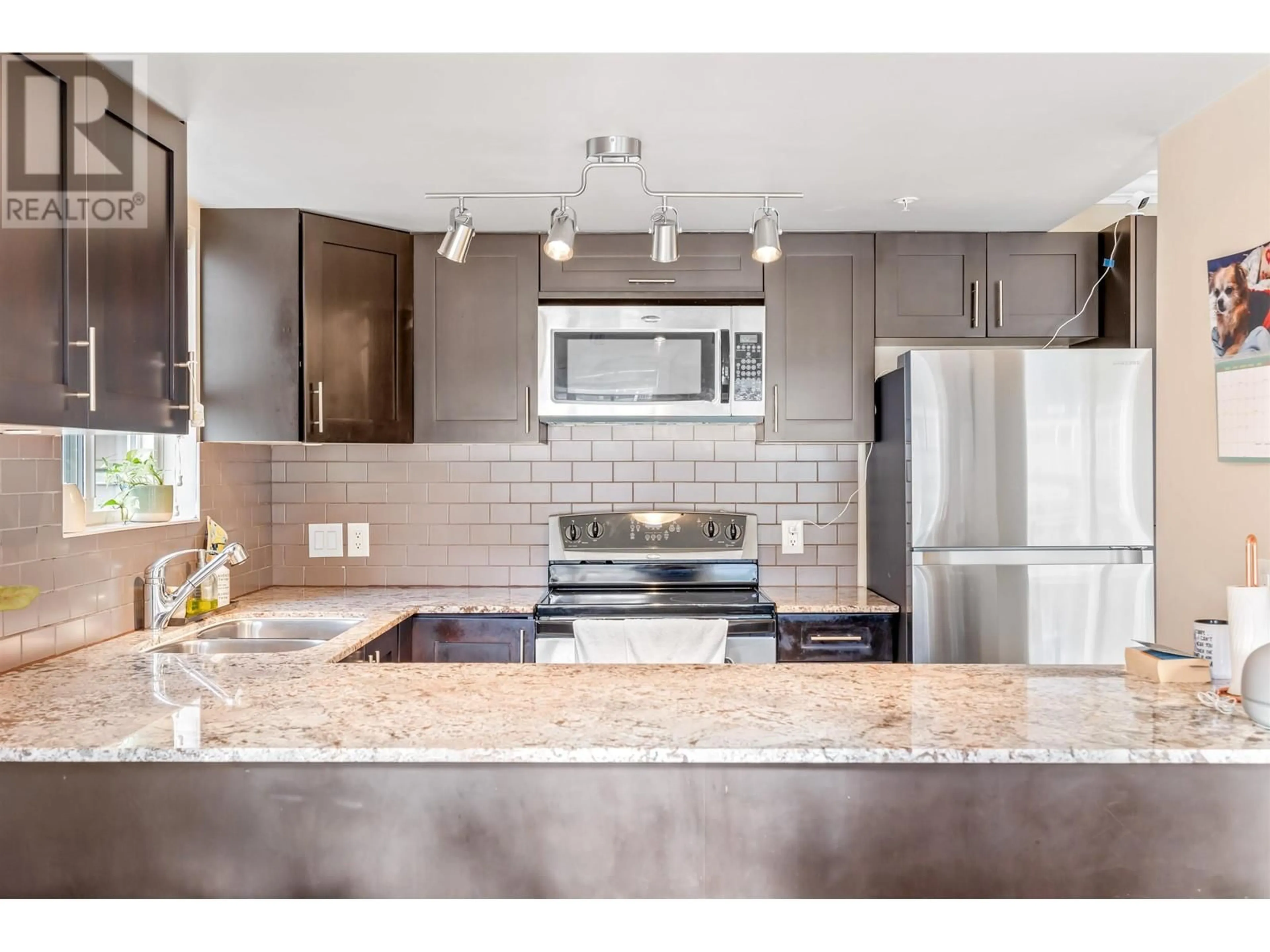 Open concept kitchen, ceramic/tile floor for 202 4025 NORFOLK STREET, Burnaby British Columbia V5G0A5