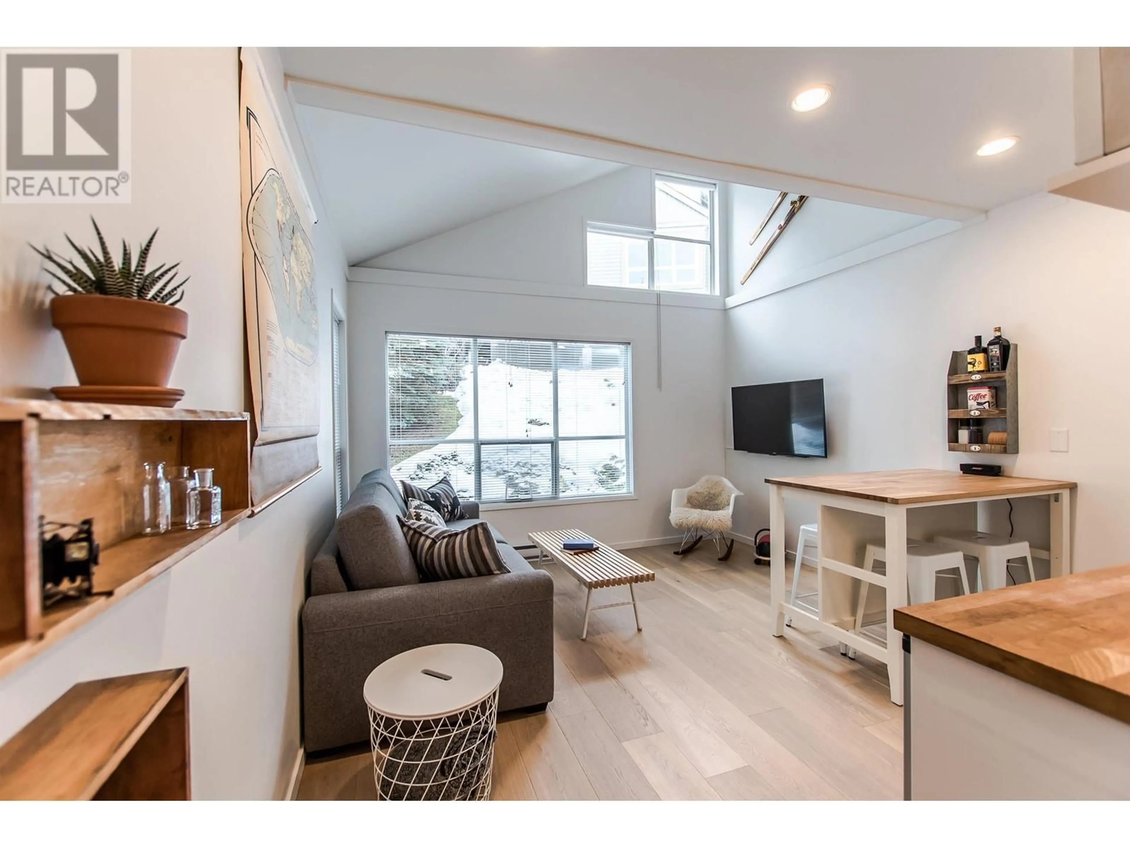 Living room with furniture, wood/laminate floor for 3 2138 SARAJEVO DRIVE, Whistler British Columbia V8E0B5