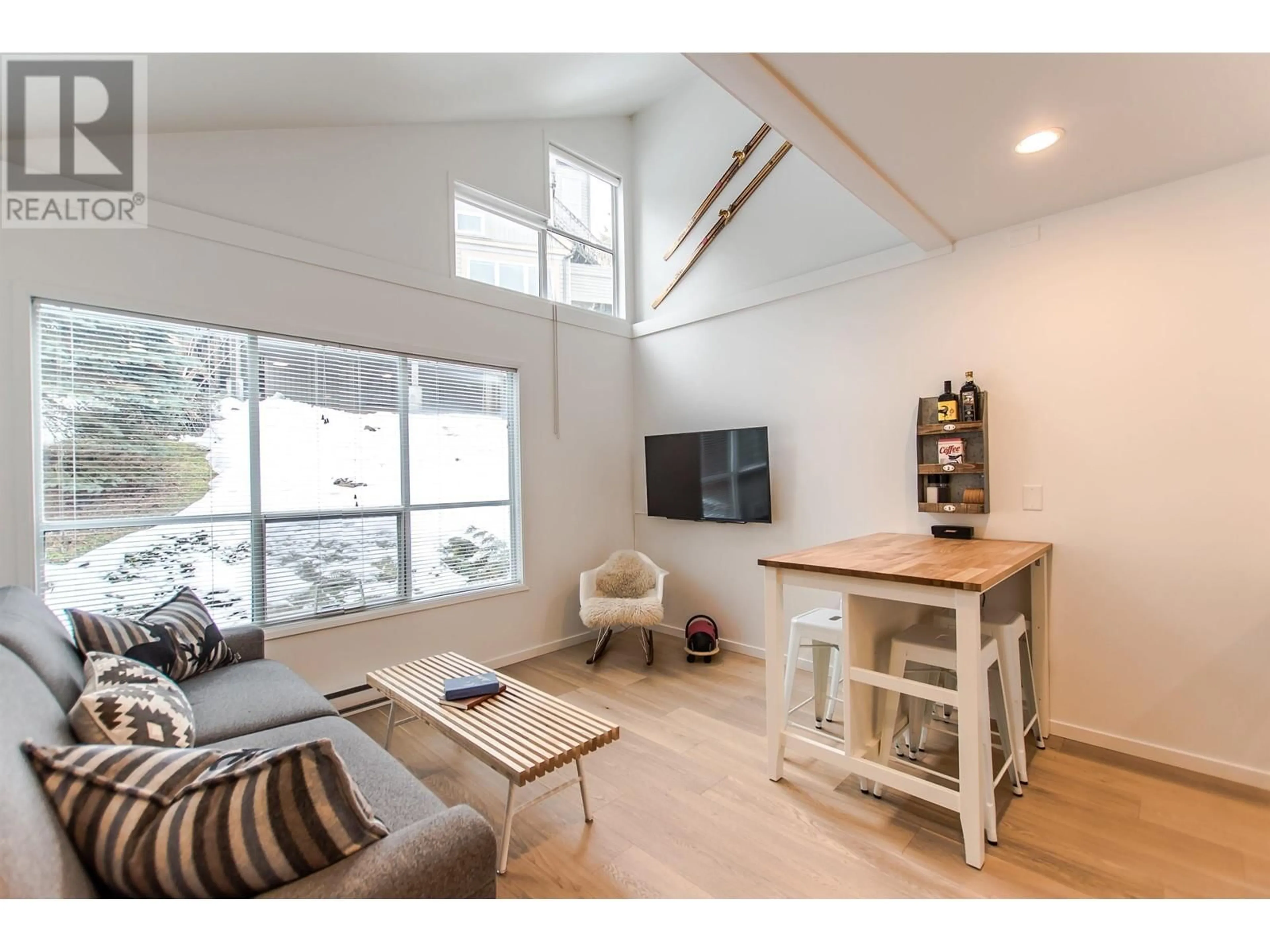 Living room with furniture, wood/laminate floor for 3 2138 SARAJEVO DRIVE, Whistler British Columbia V8E0B5