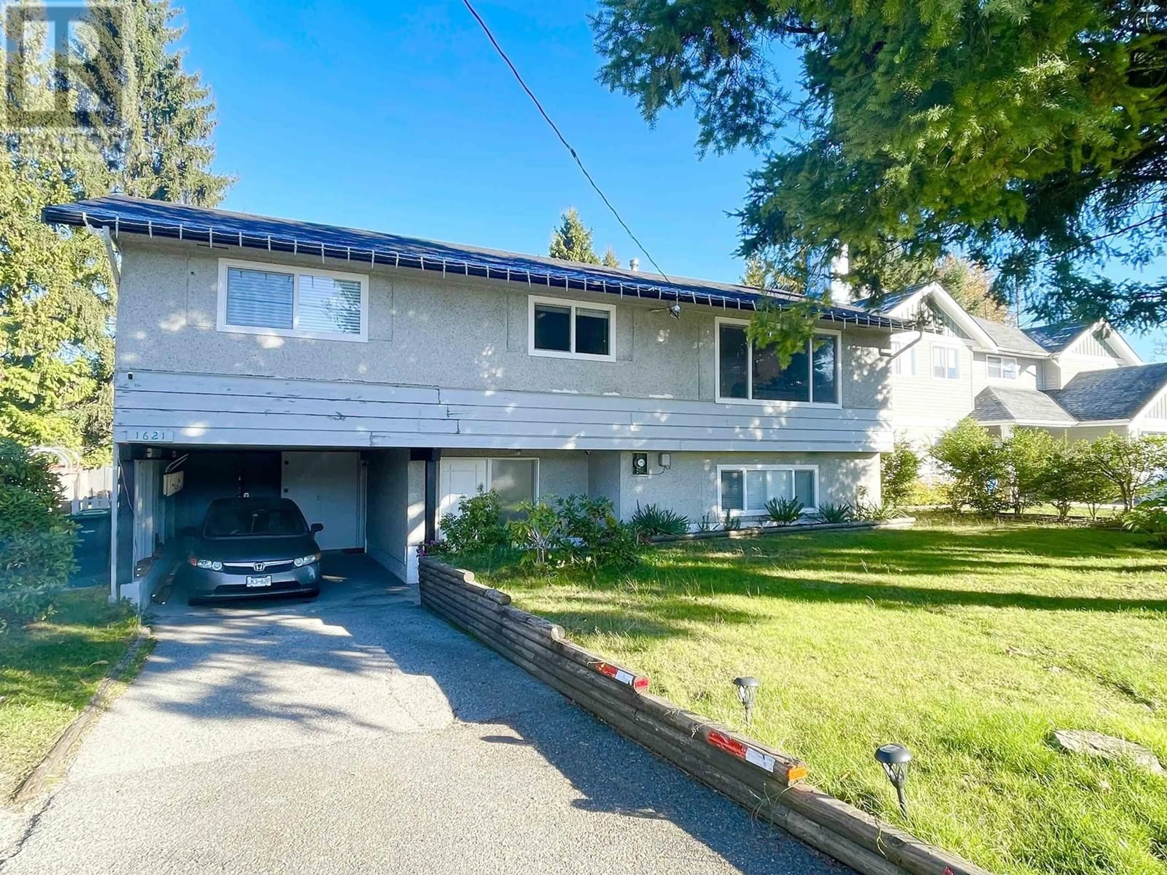 A pic from outside/outdoor area/front of a property/back of a property/a pic from drone, street for 1621 COMO LAKE AVENUE, Coquitlam British Columbia V3J3P7