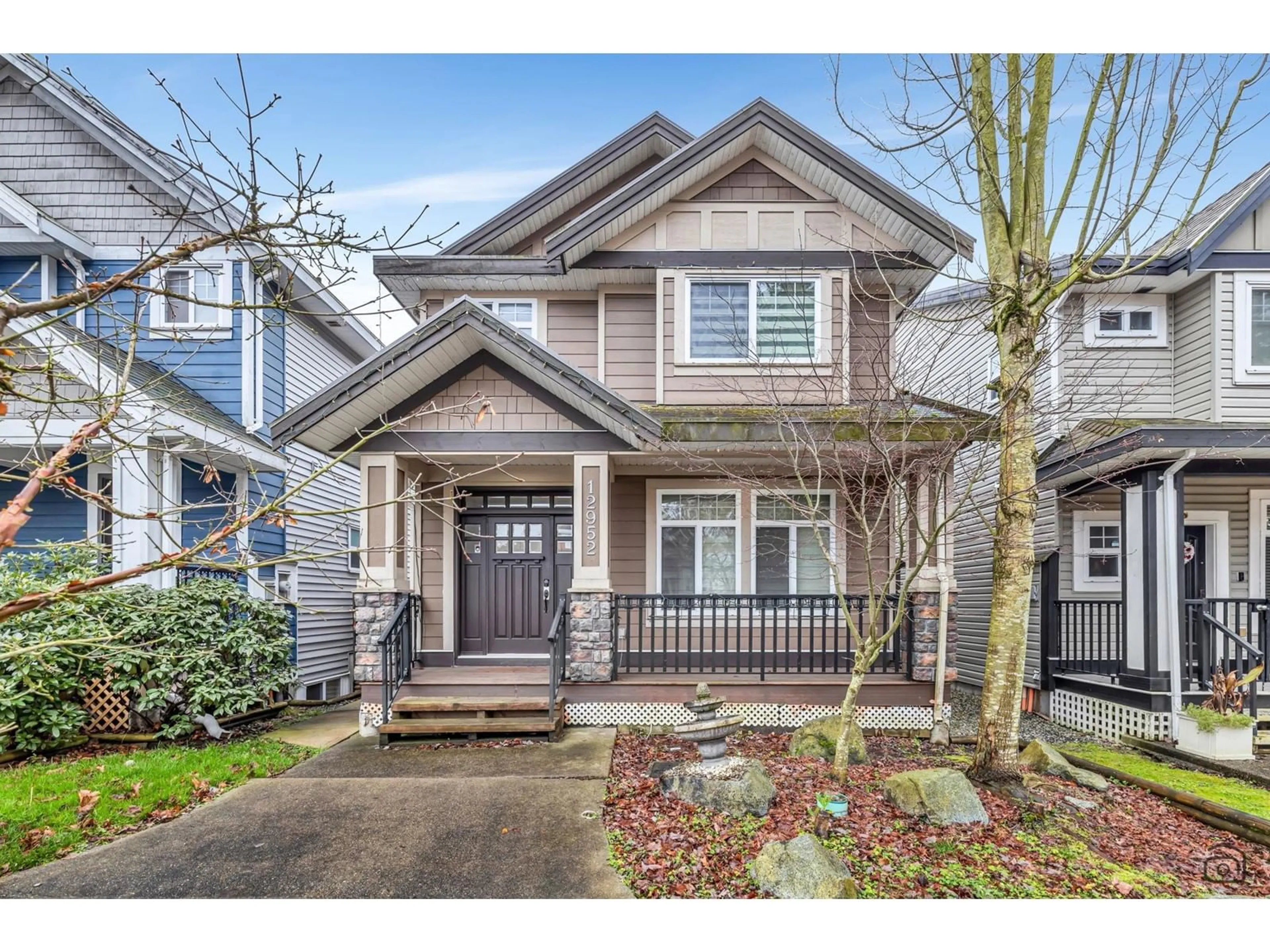 Home with vinyl exterior material, street for 12952 60 AVENUE, Surrey British Columbia V3X2L5