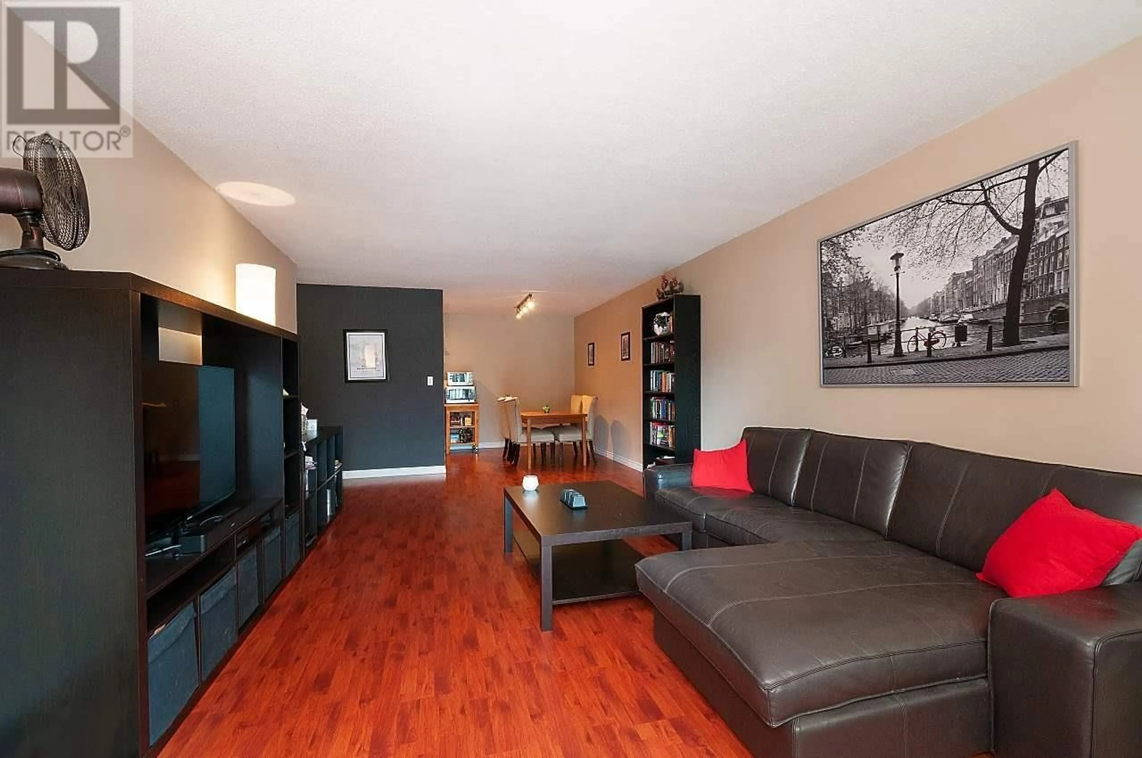 Living room with furniture, wood/laminate floor for 314 - 780 PREMIER STREET, North Vancouver British Columbia V7J2G8