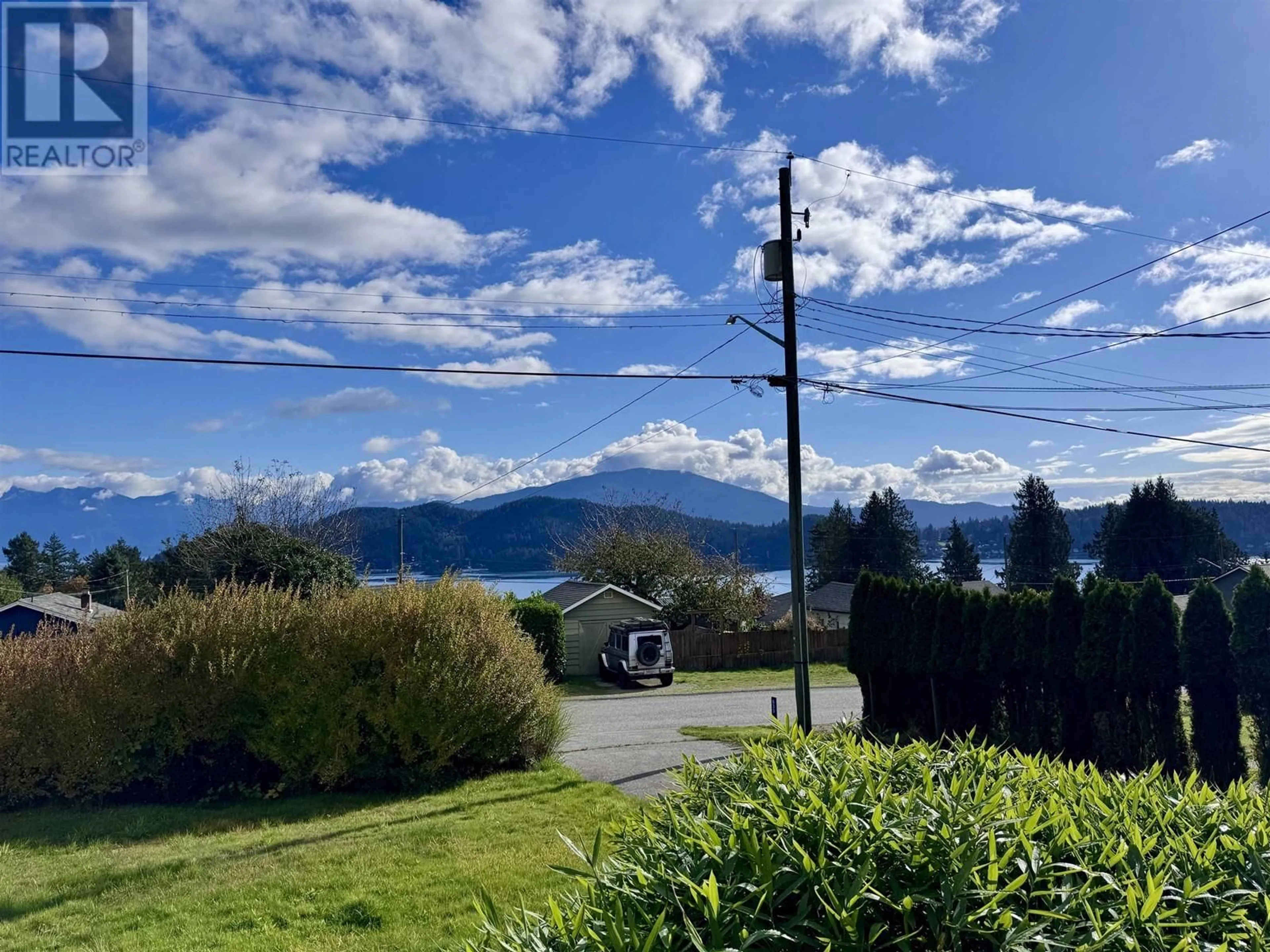 A pic from outside/outdoor area/front of a property/back of a property/a pic from drone, water/lake/river/ocean view for 635 MARTIN ROAD, Gibsons British Columbia V0N1V9