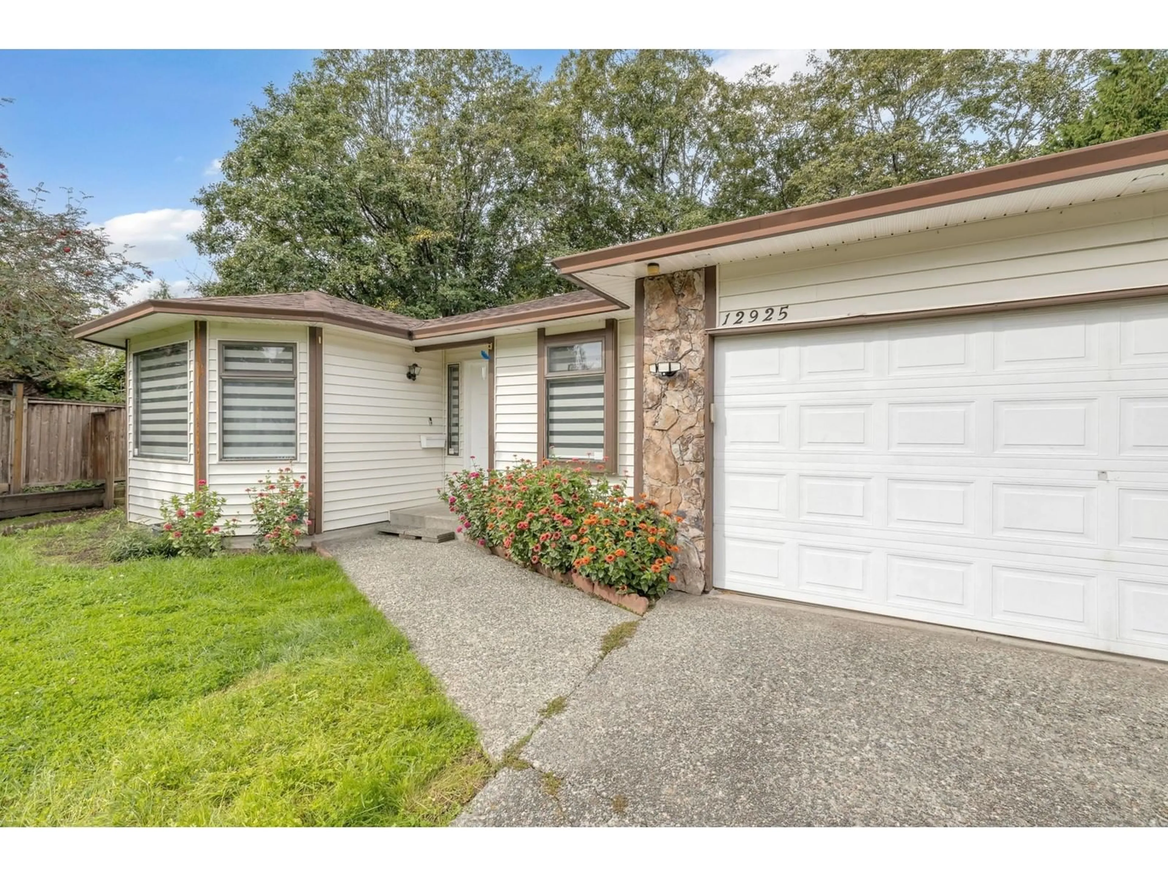 Home with vinyl exterior material, street for 12925 65, Surrey British Columbia V3W9H4