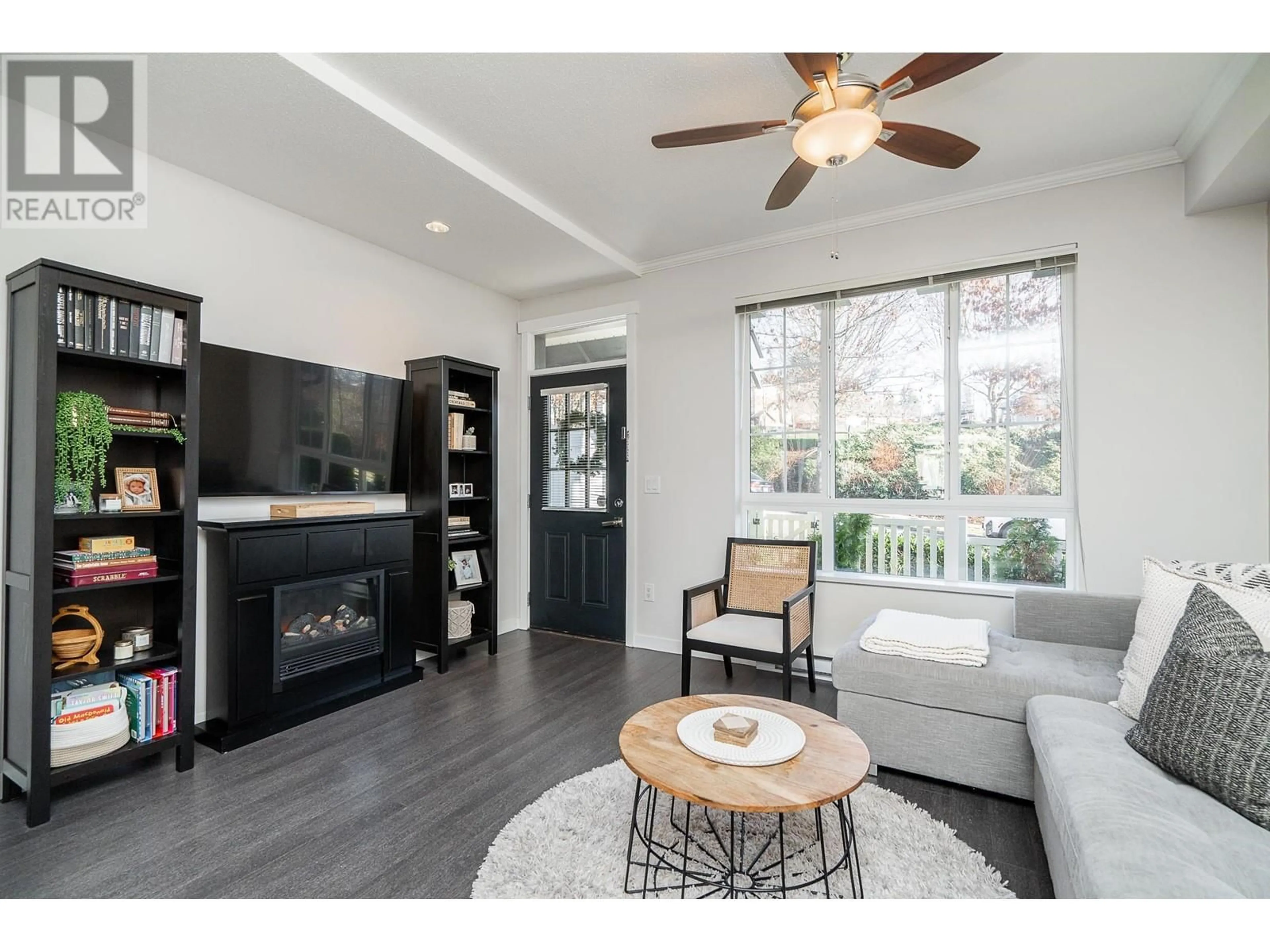 Living room with furniture, wood/laminate floor for 76 1338 HAMES CRESCENT, Coquitlam British Columbia V3E0J2